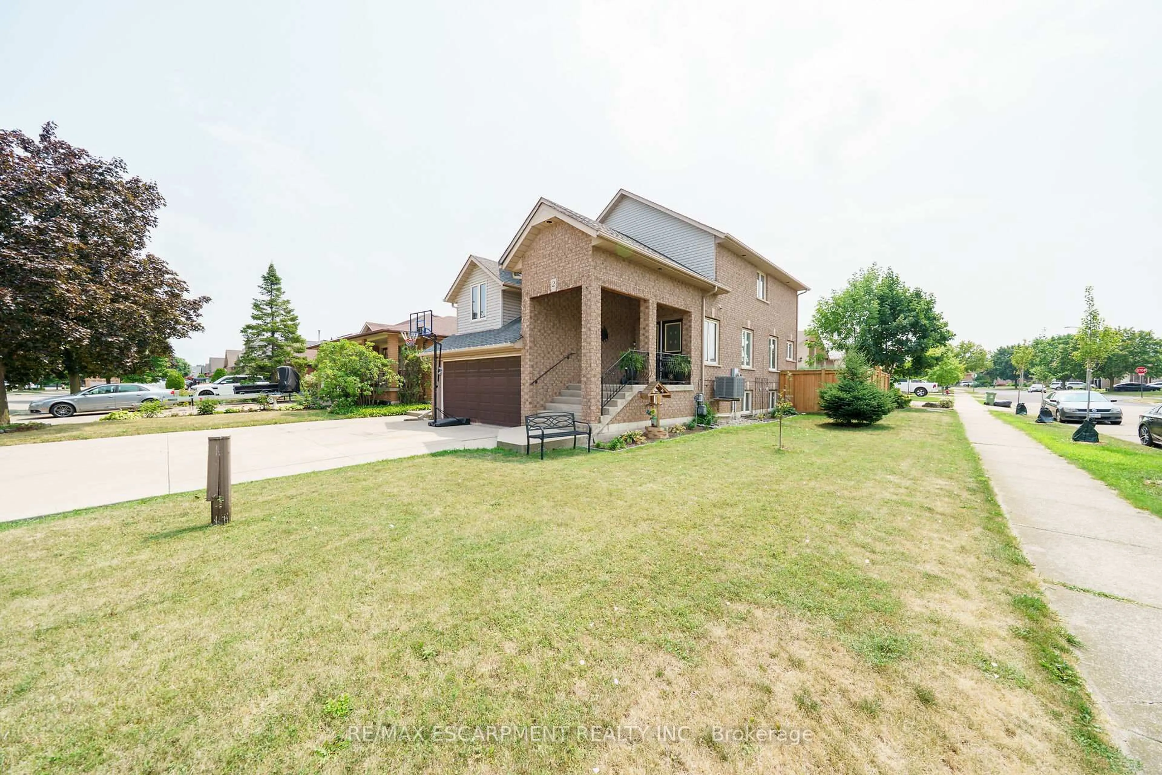 Home with brick exterior material, street for 2 Tyler Dr, Hamilton Ontario L8E 4W9