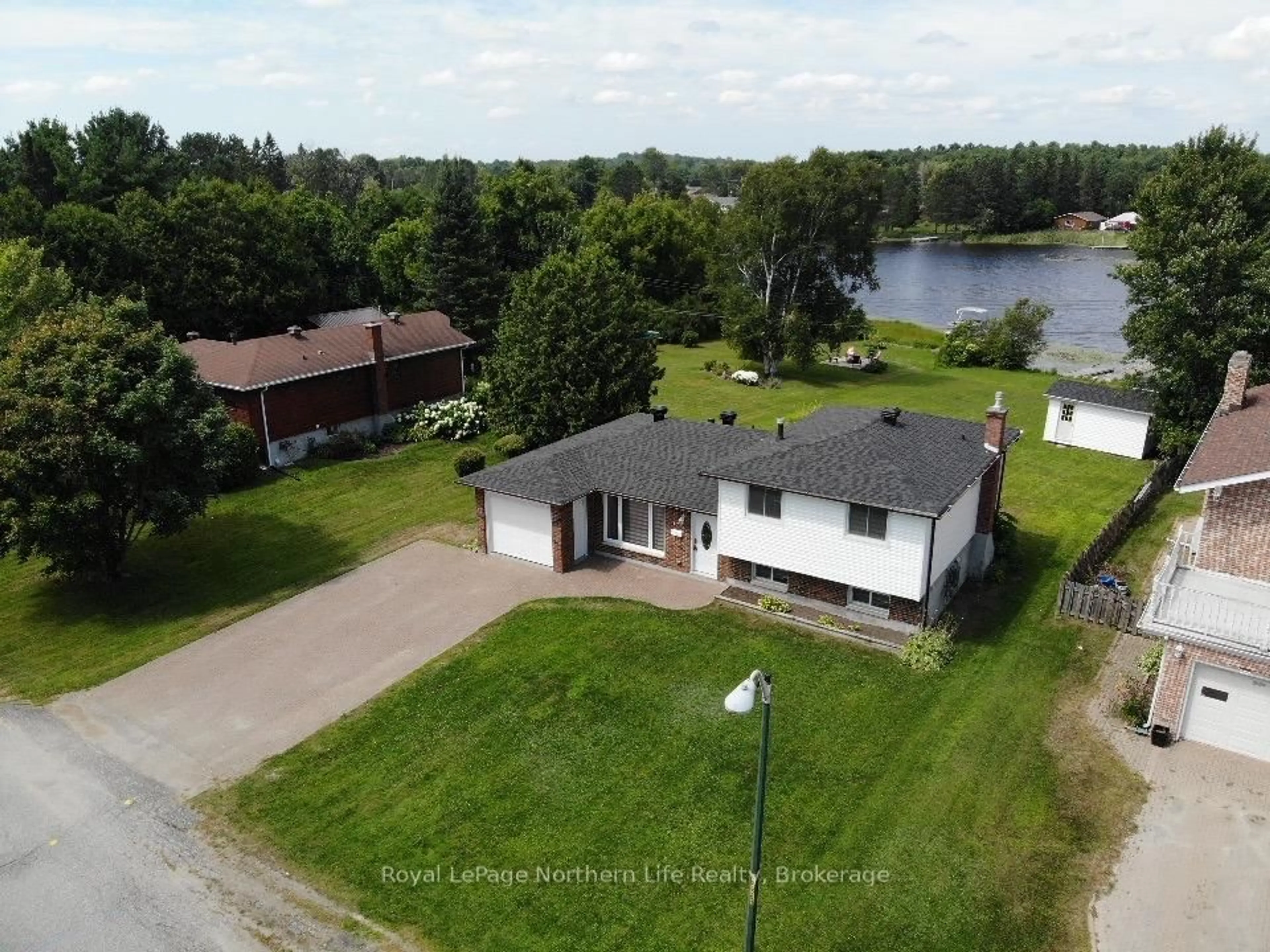 A pic from outside/outdoor area/front of a property/back of a property/a pic from drone, water/lake/river/ocean view for 177 Bourgault St, West Nipissing Ontario P2B 1T8