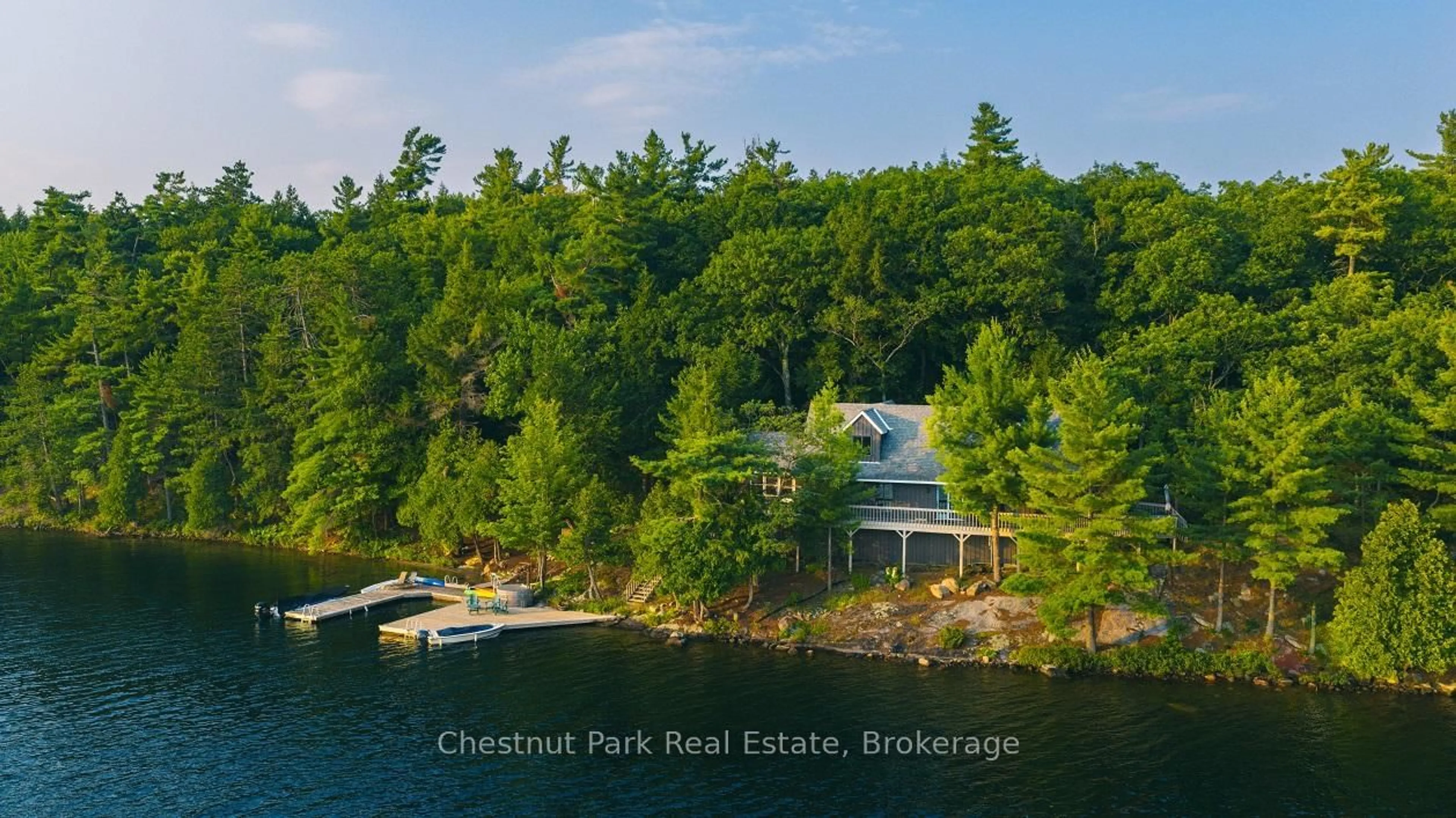 A pic from outside/outdoor area/front of a property/back of a property/a pic from drone, water/lake/river/ocean view for 7 Wegamind Island, Seguin Ontario P0C 1H0