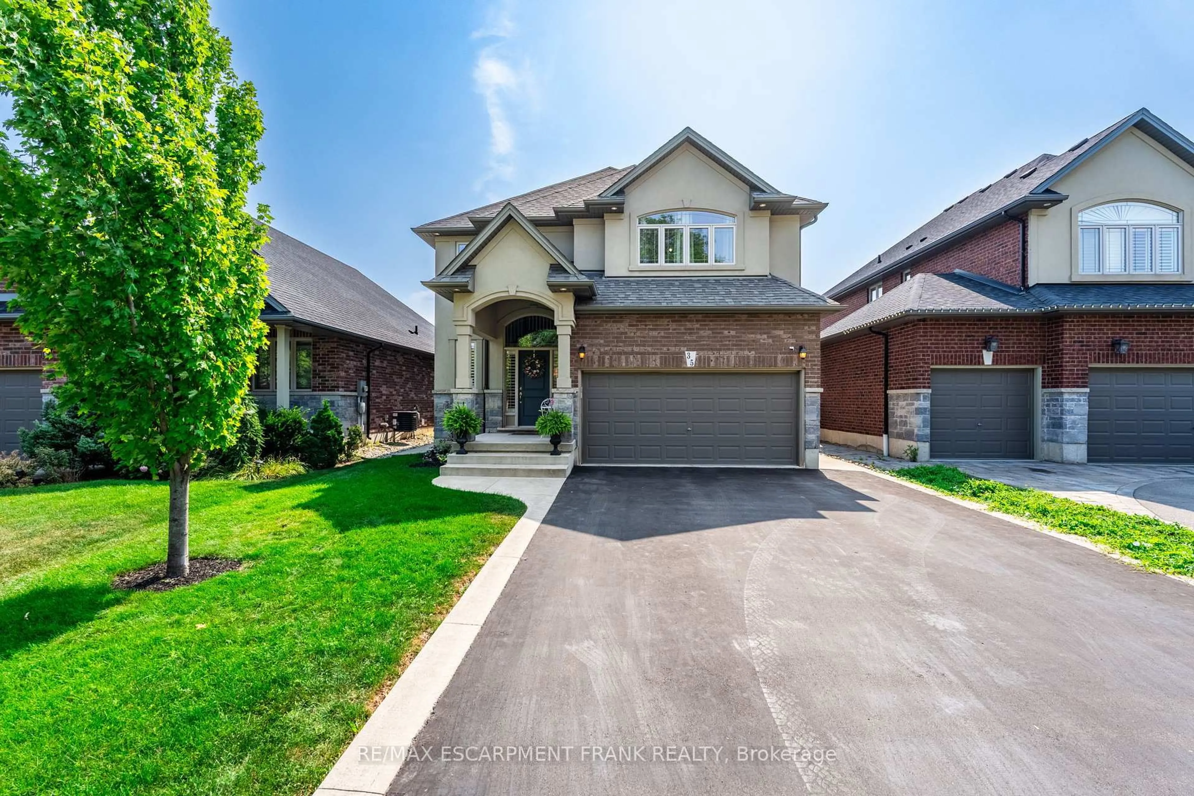 Home with brick exterior material, street for 35 PURNELL Dr, Hamilton Ontario L9C 0C6