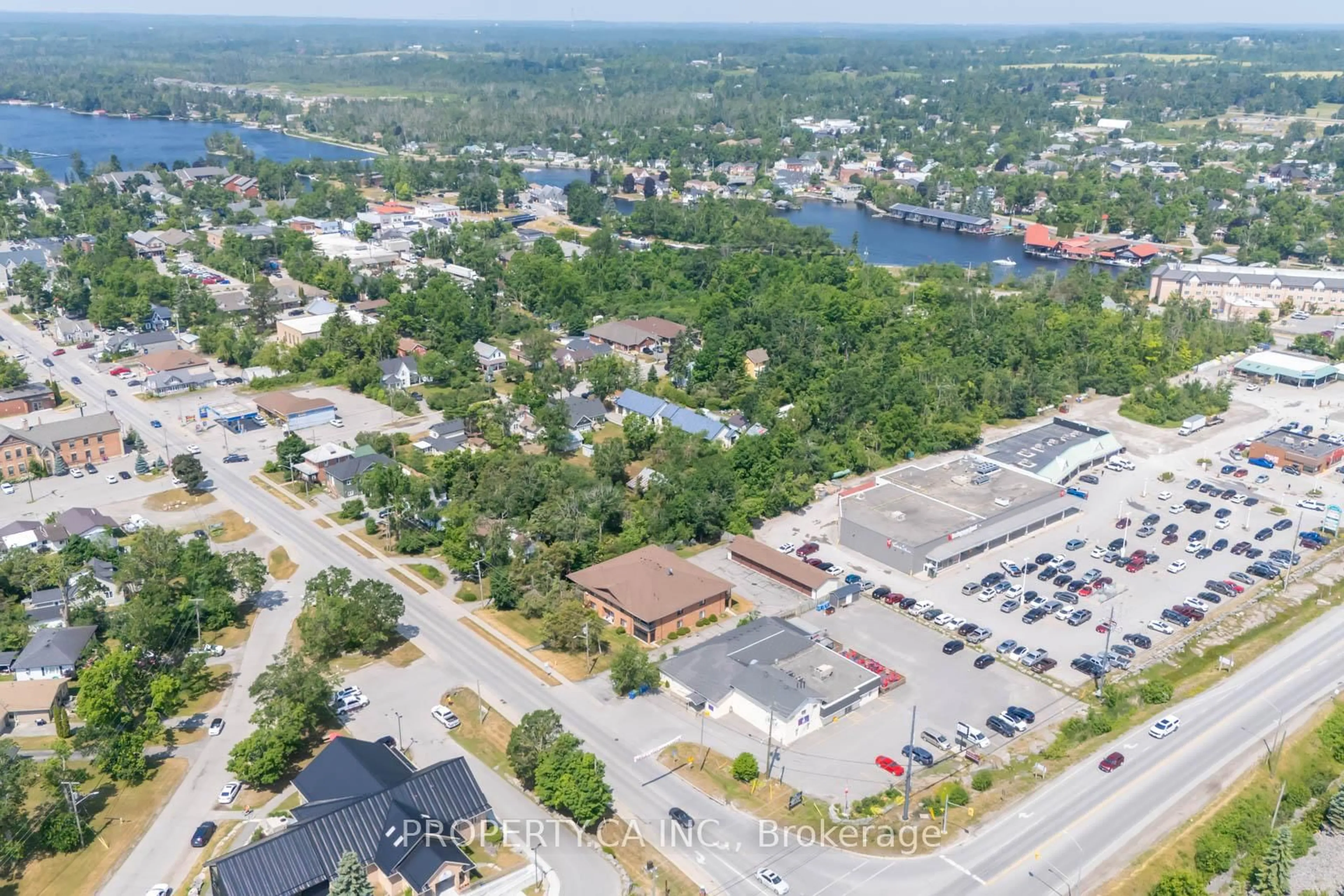 A pic from outside/outdoor area/front of a property/back of a property/a pic from drone, water/lake/river/ocean view for 90 King St #7, Kawartha Lakes Ontario K0M 1A0