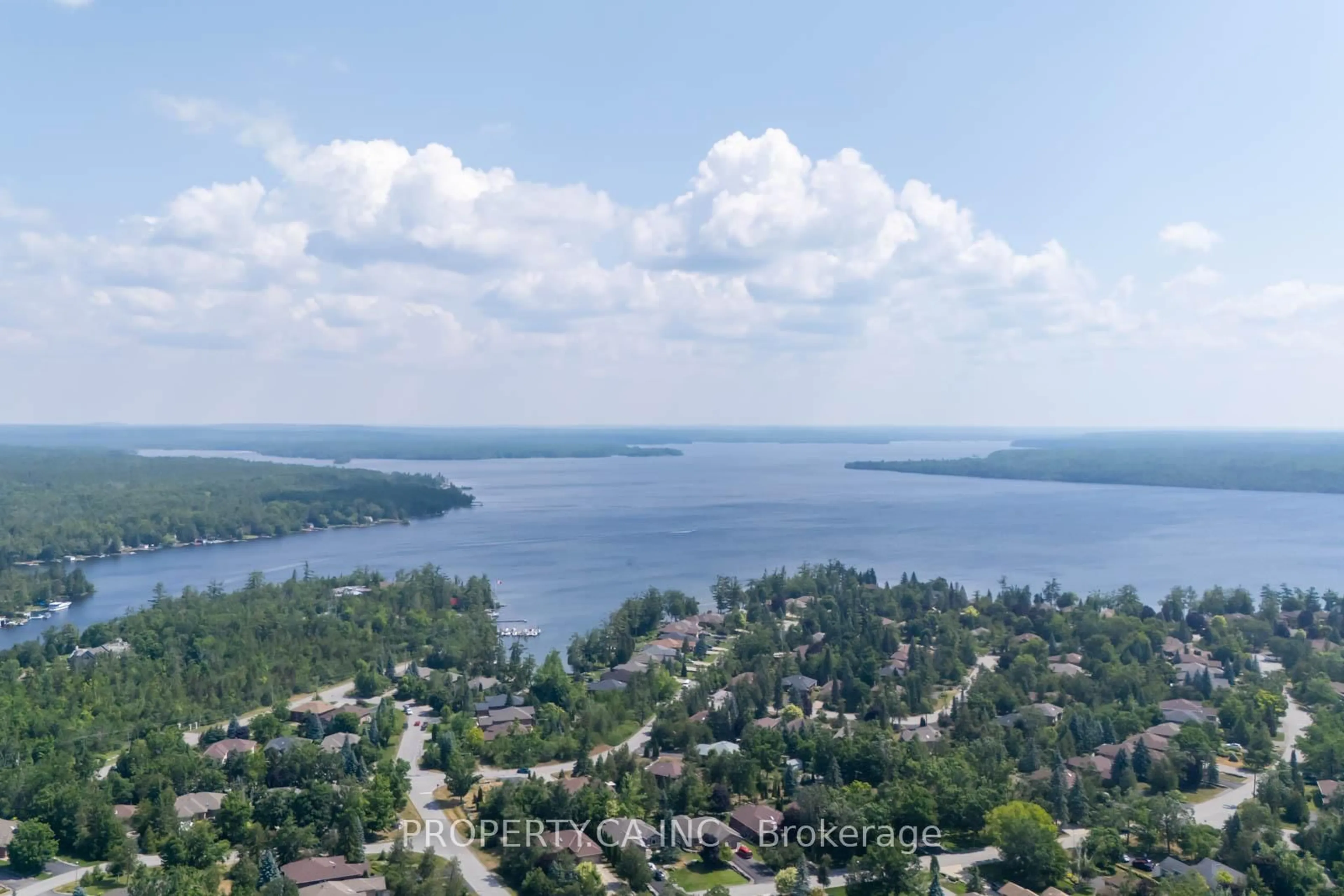 A pic from outside/outdoor area/front of a property/back of a property/a pic from drone, water/lake/river/ocean view for 90 King St #7, Kawartha Lakes Ontario K0M 1A0