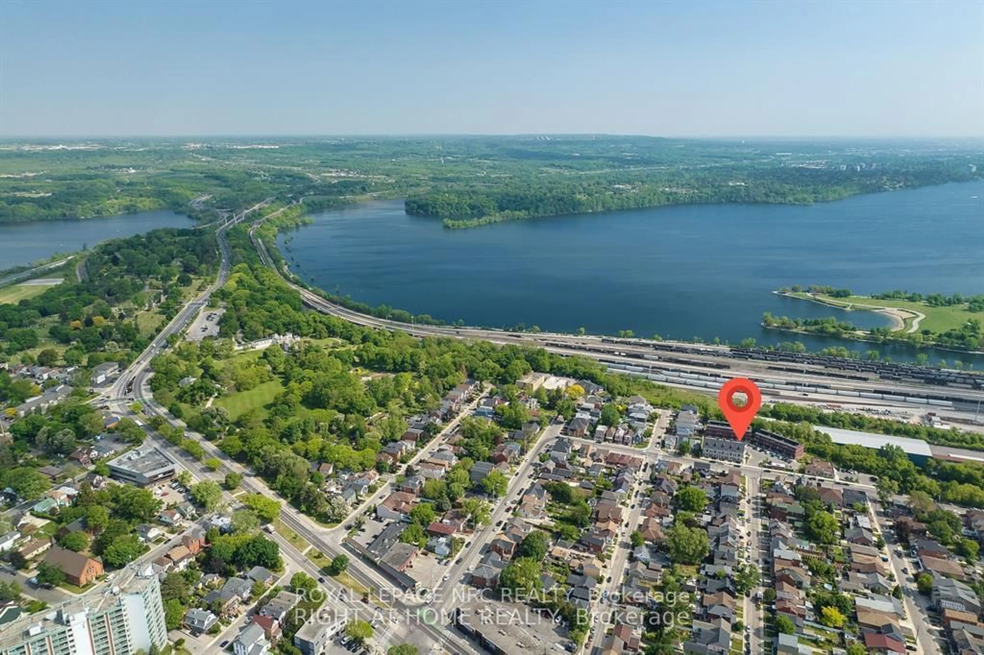 A pic from outside/outdoor area/front of a property/back of a property/a pic from drone, water/lake/river/ocean view for 290 Barton St #30, Hamilton Ontario L8R 3P3