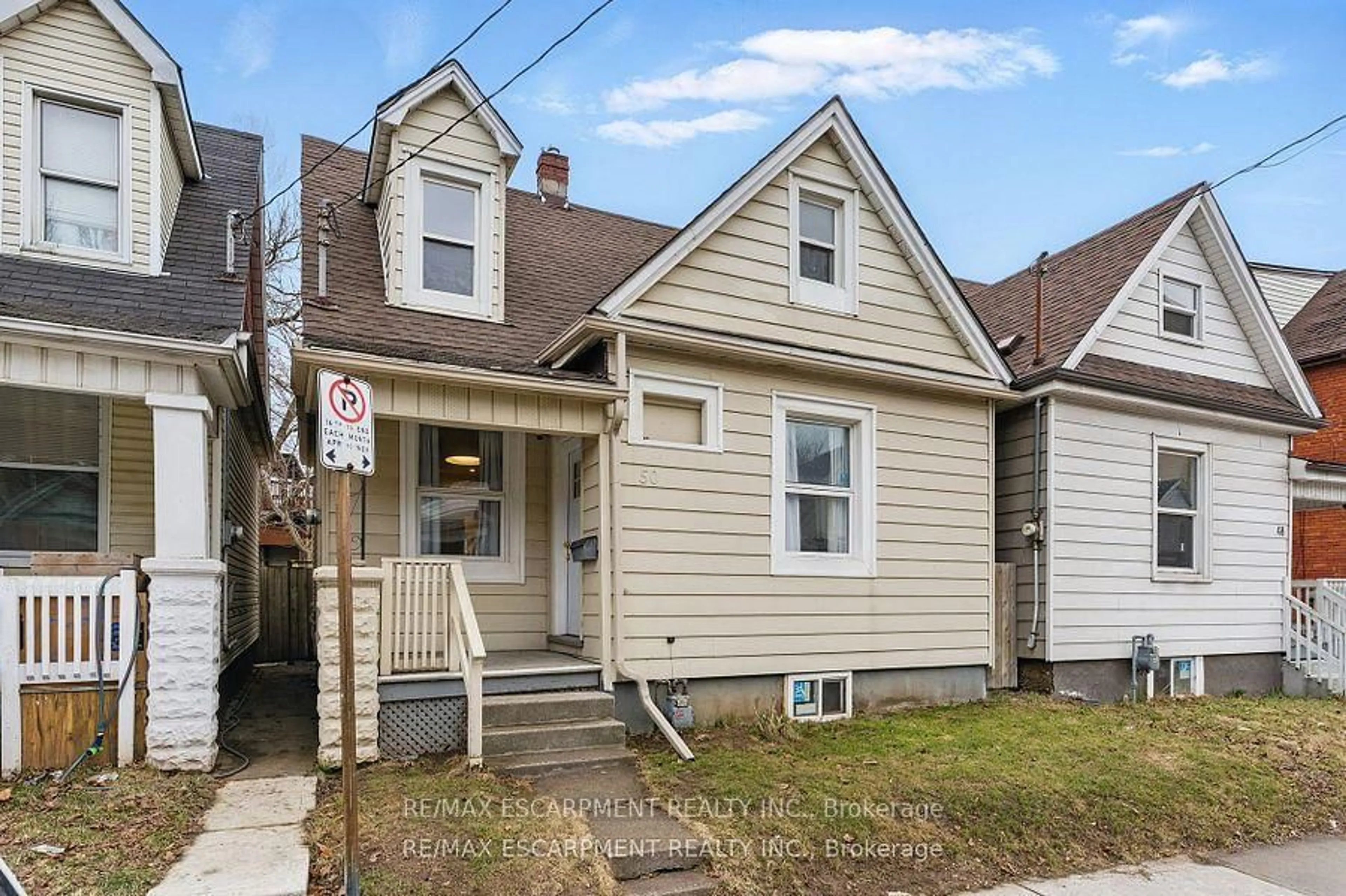 Home with vinyl exterior material, street for 50 HARVEY St, Hamilton Ontario L8L 2L8