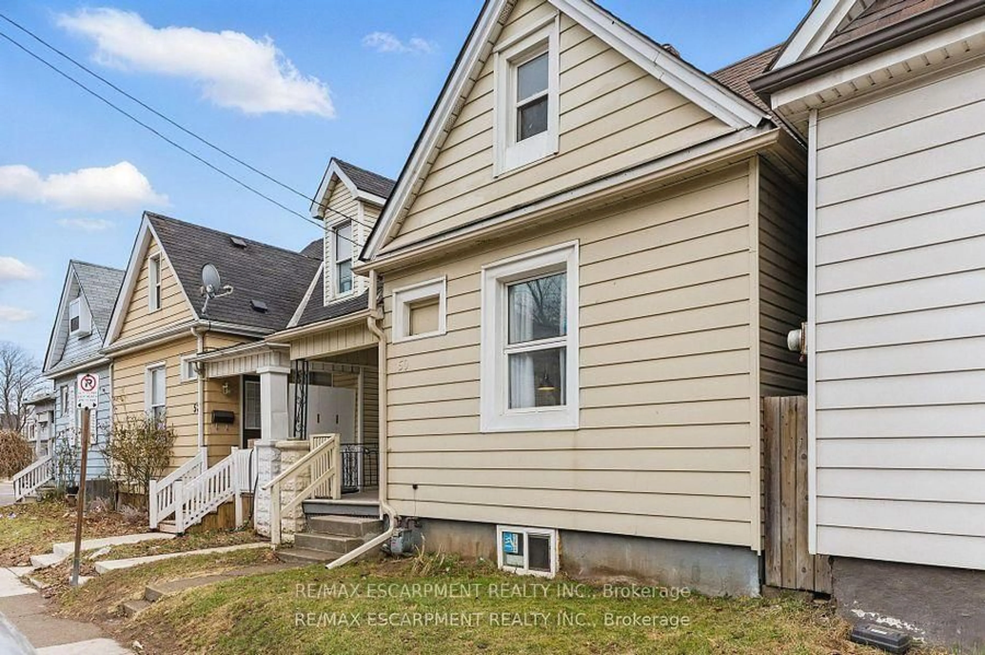 Home with vinyl exterior material, street for 50 HARVEY St, Hamilton Ontario L8L 2L8