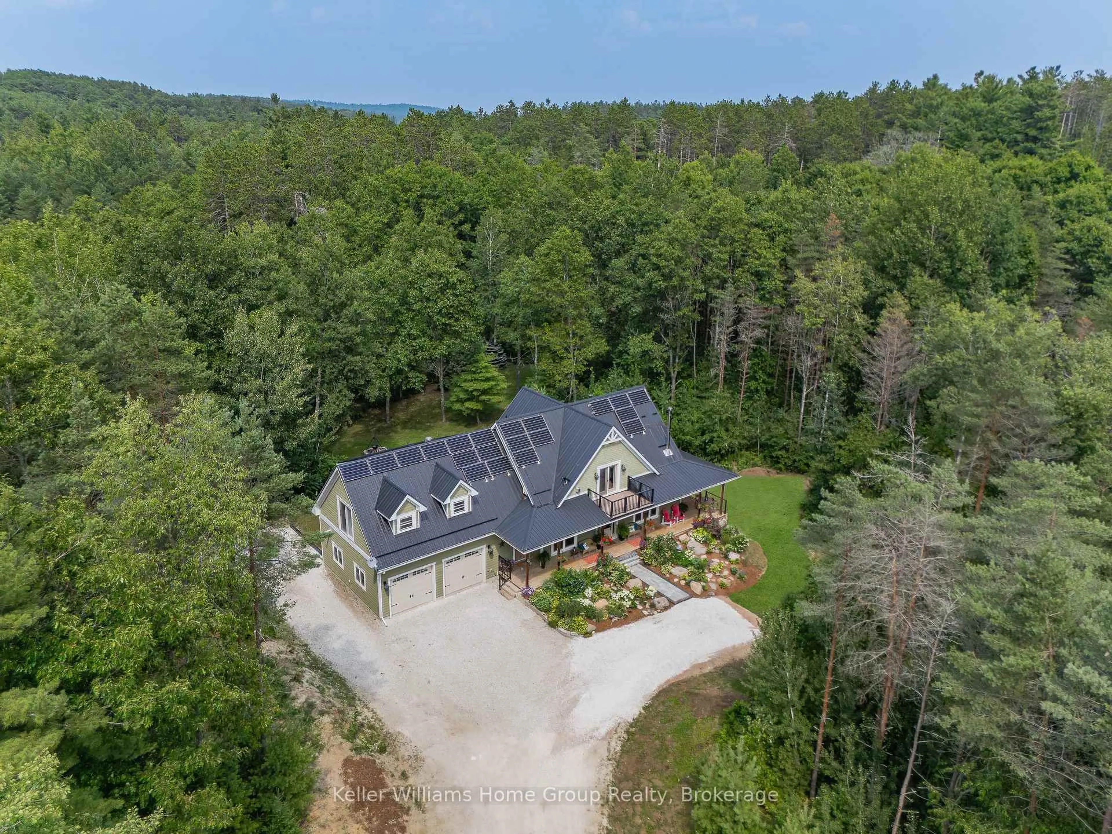 A pic from outside/outdoor area/front of a property/back of a property/a pic from drone, unknown for 668147 20th Sdrd, Mulmur Ontario L9V 0W1