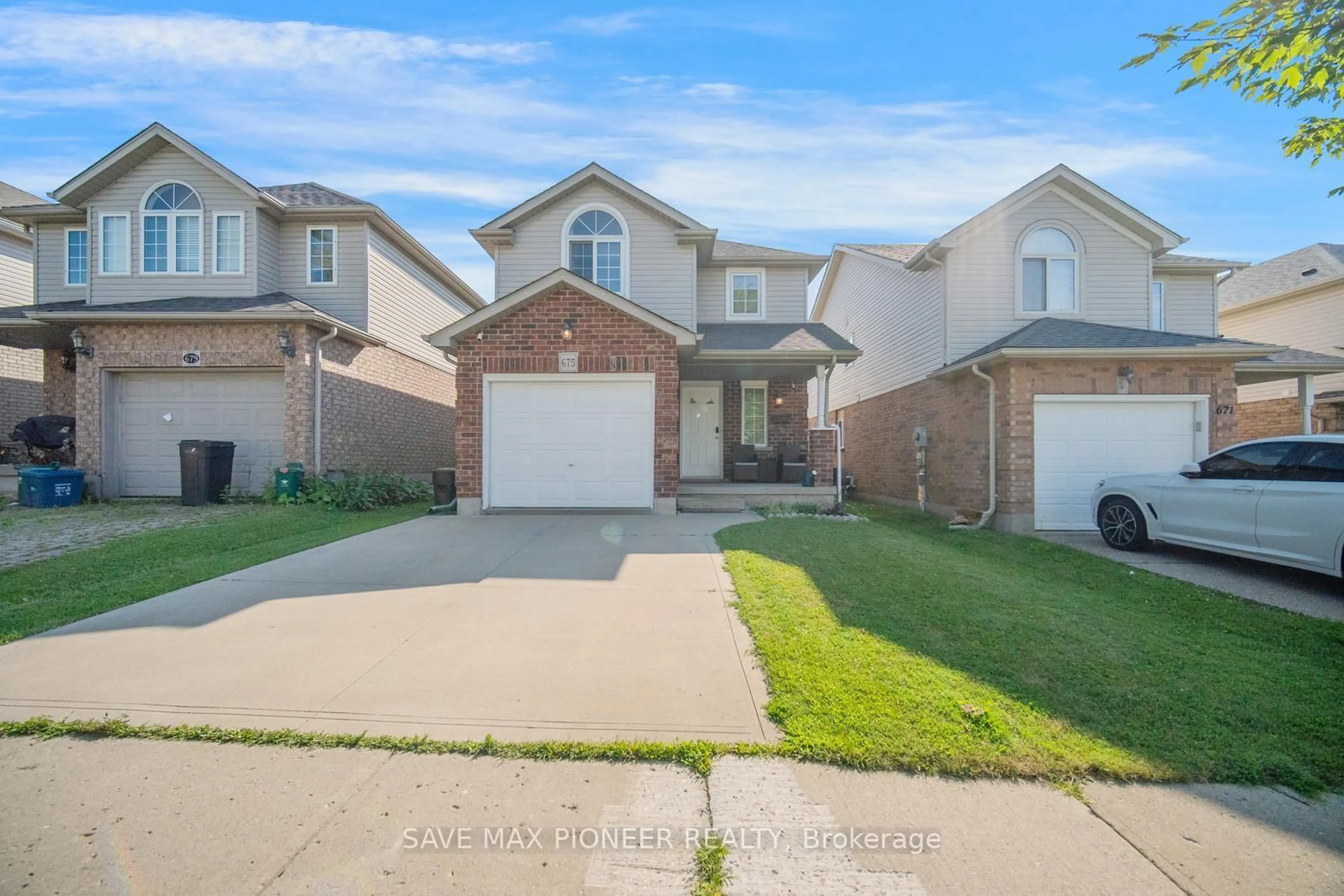 Home with brick exterior material, street for 675 Karlsfeld Rd, Waterloo Ontario N2T 2V3
