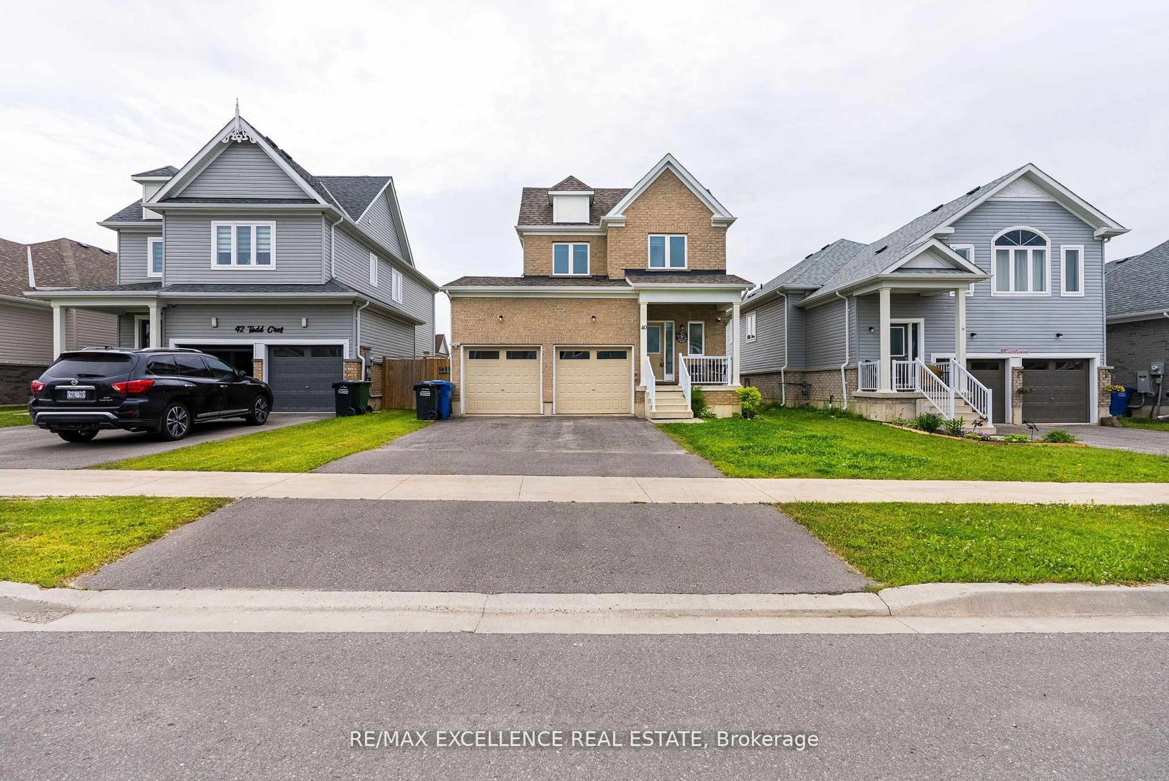 A pic from outside/outdoor area/front of a property/back of a property/a pic from drone, street for 40 Todd Cres, Southgate Ontario N0C 1B0