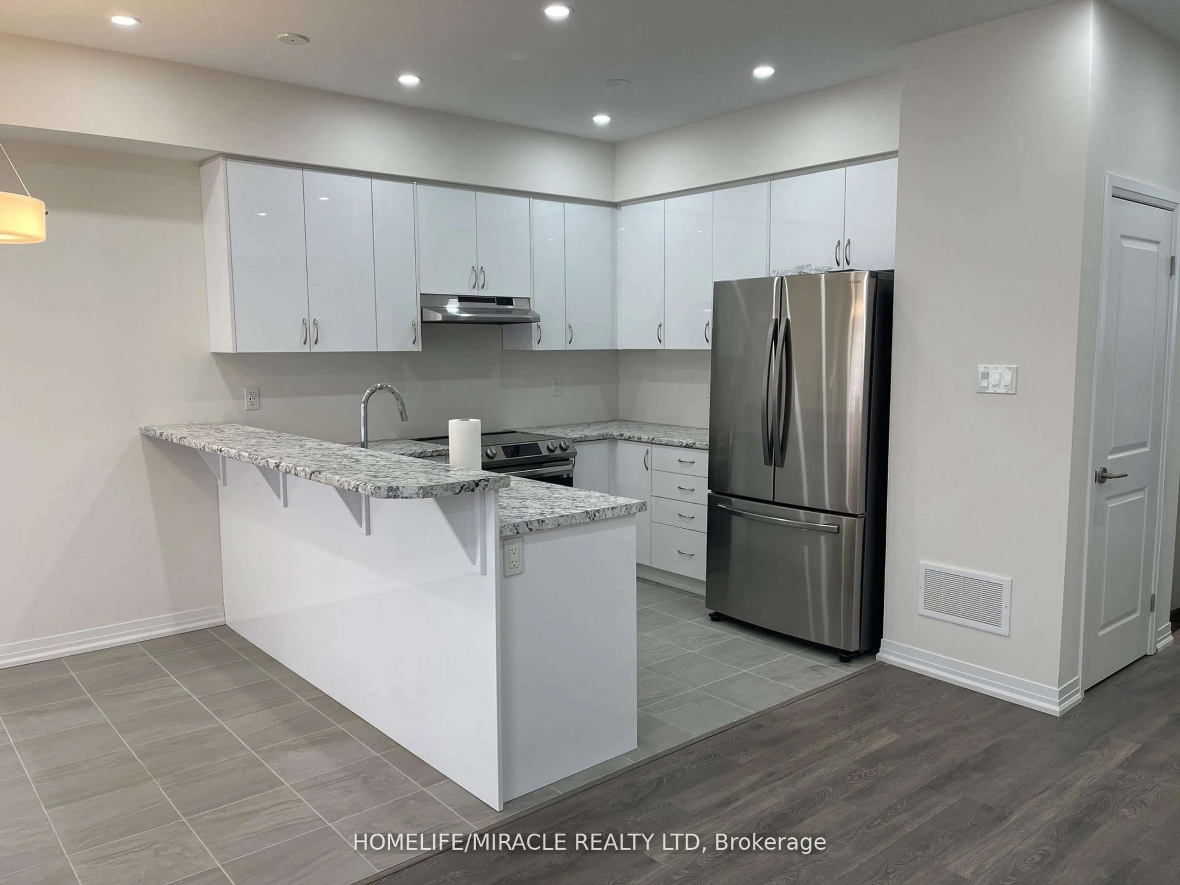Open concept kitchen, ceramic/tile floor for 27 George Briar Dr, Brant Ontario N3L 0L1