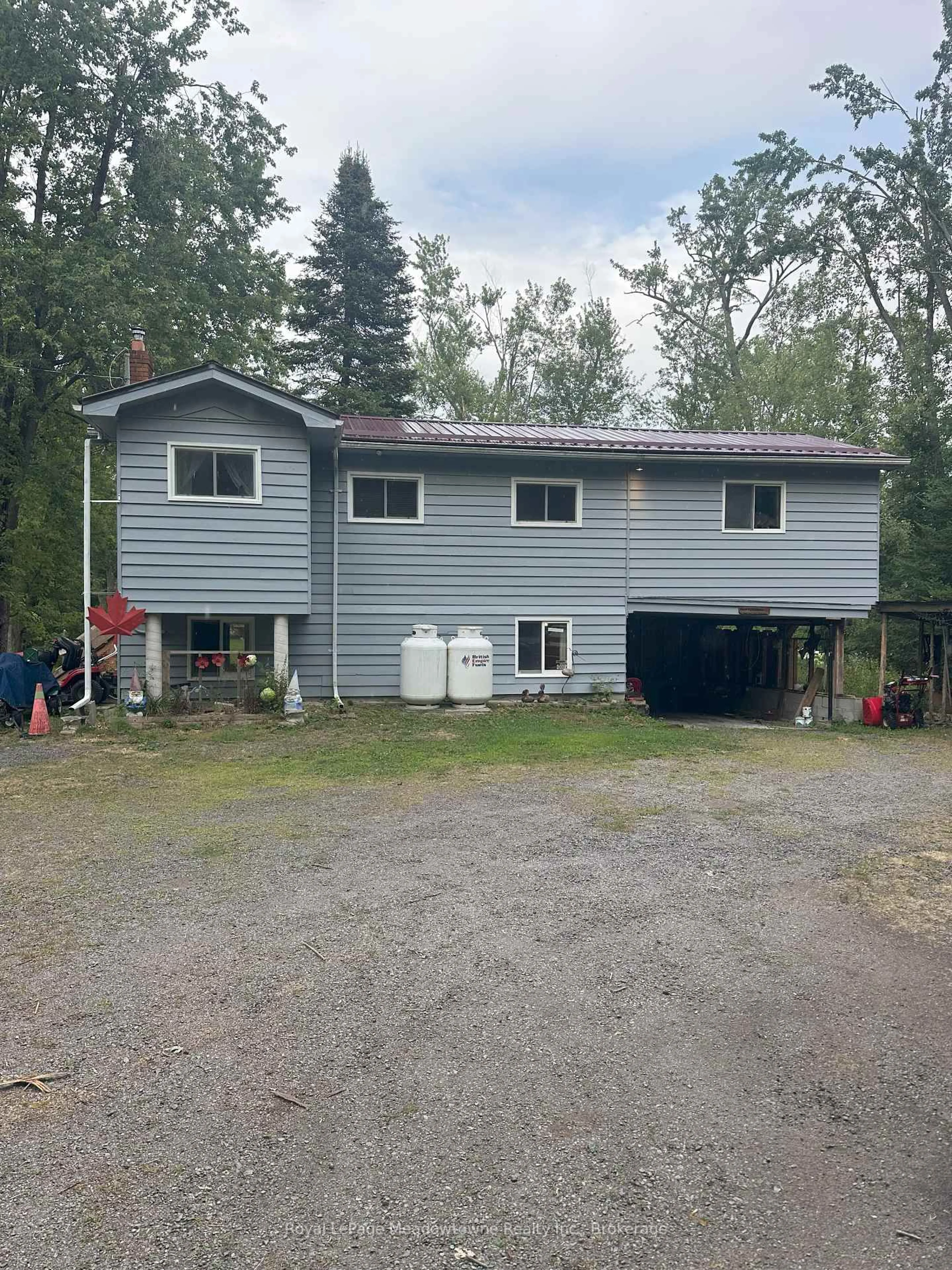A pic from outside/outdoor area/front of a property/back of a property/a pic from drone, unknown for 67 Kennedy Dr, Trent Lakes Ontario K0M 1A0
