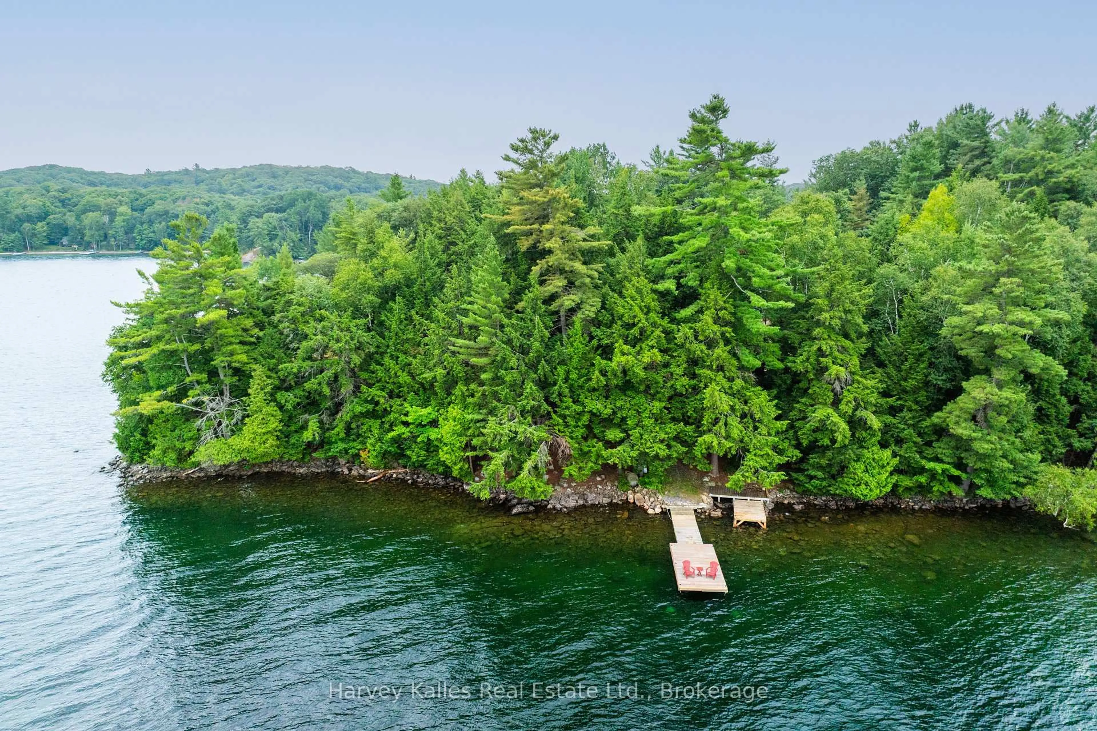 A pic from outside/outdoor area/front of a property/back of a property/a pic from drone, water/lake/river/ocean view for 25 Clifton Island, Muskoka Lakes Ontario P0B 1M0