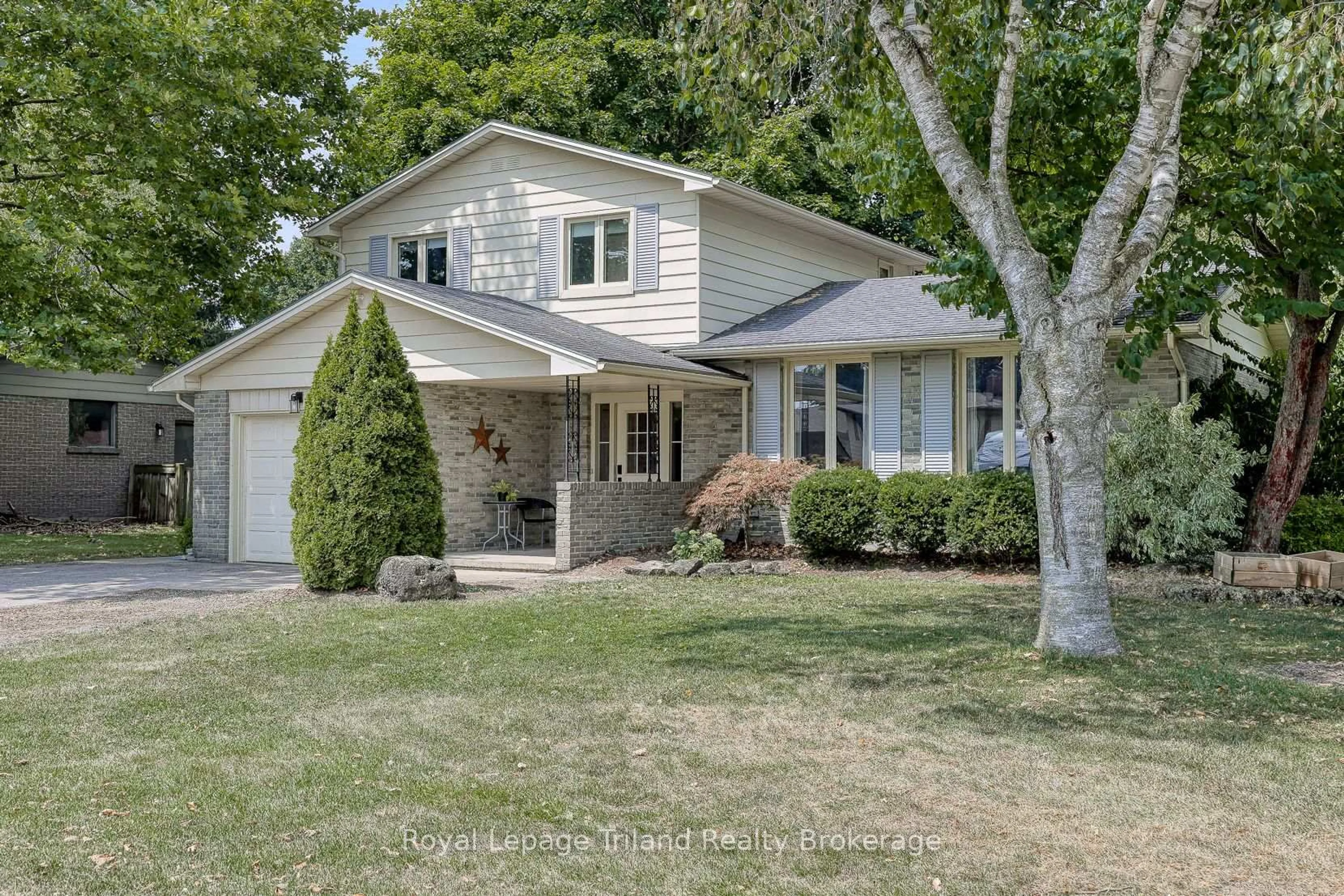 Home with vinyl exterior material, street for 214 Stanley St, Zorra Ontario N0M 2M0