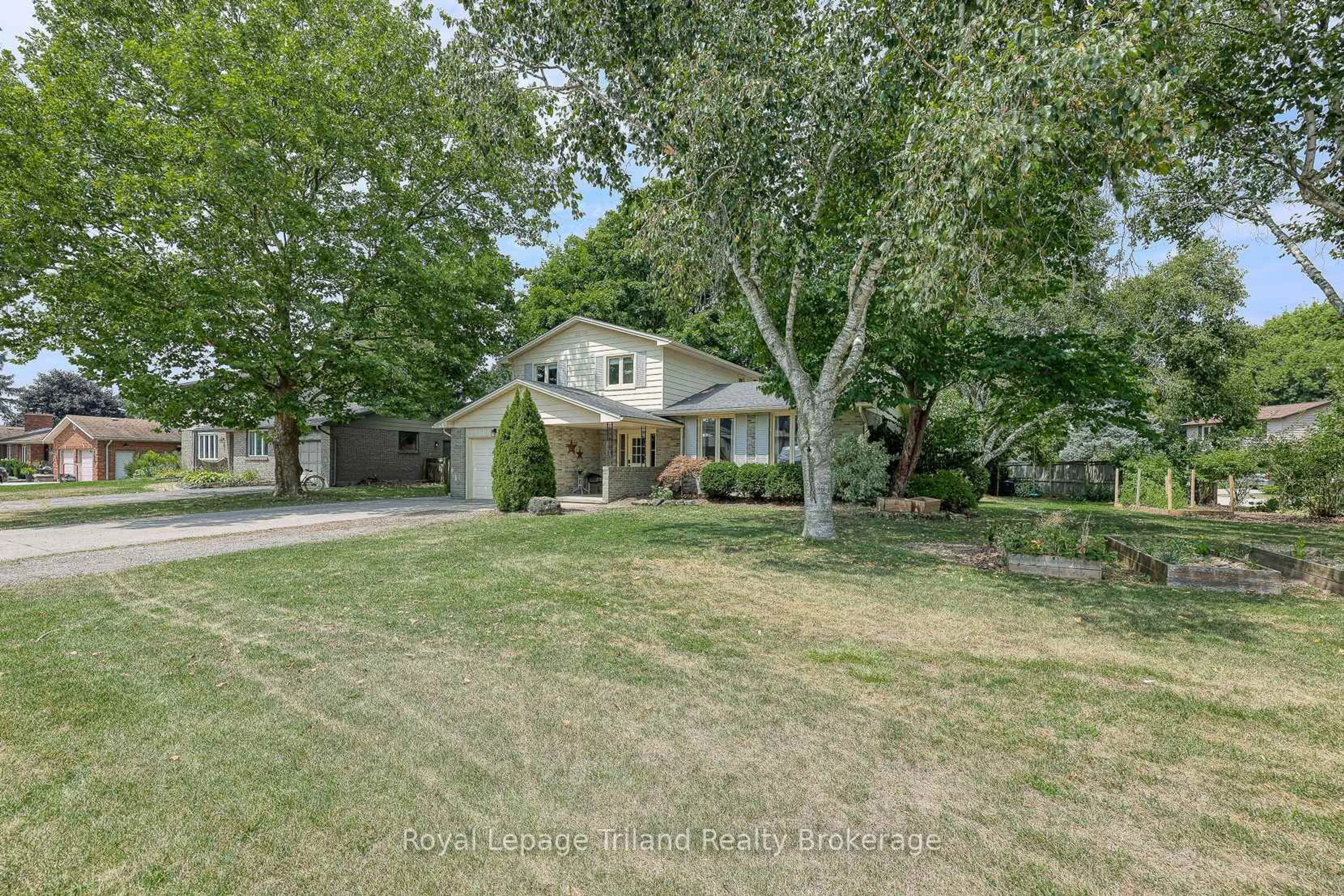 A pic from outside/outdoor area/front of a property/back of a property/a pic from drone, street for 214 Stanley St, Zorra Ontario N0M 2M0