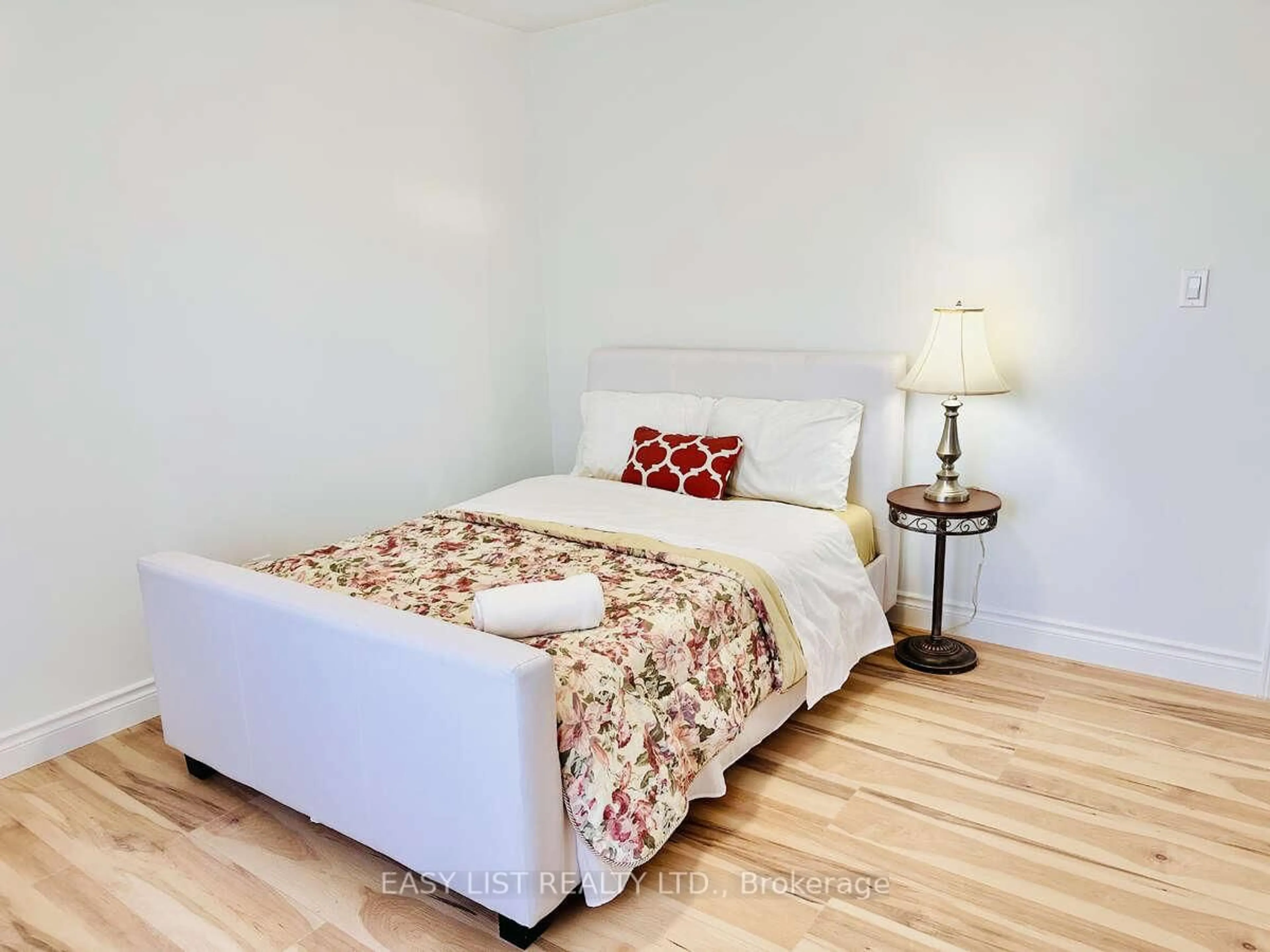 Bedroom with bed, wood/laminate floor for 664 King St, Port Colborne Ontario L3K 4H8