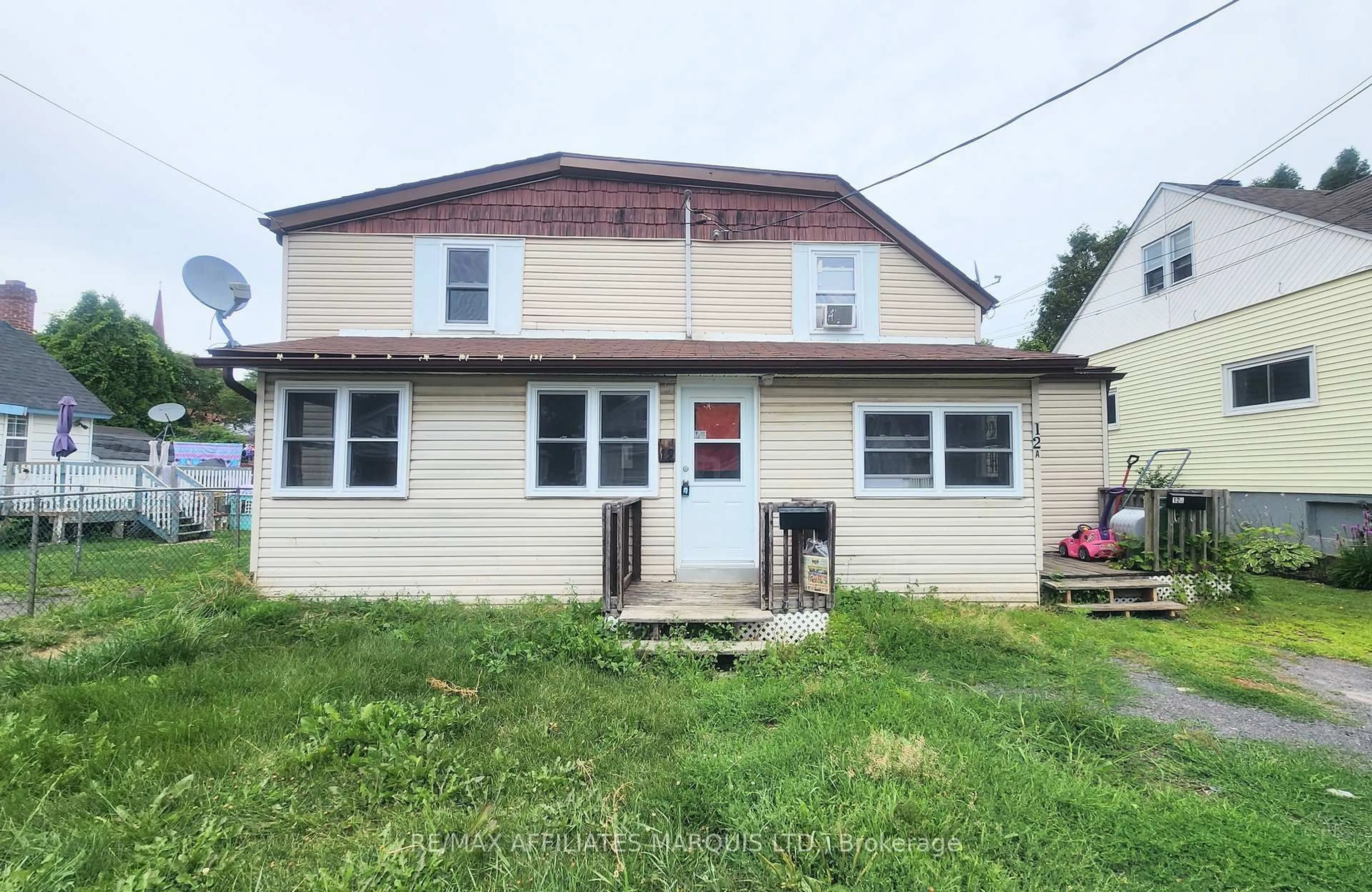 Home with vinyl exterior material, building for 12-12A Cartier Ave, Cornwall Ontario K6J 4B4