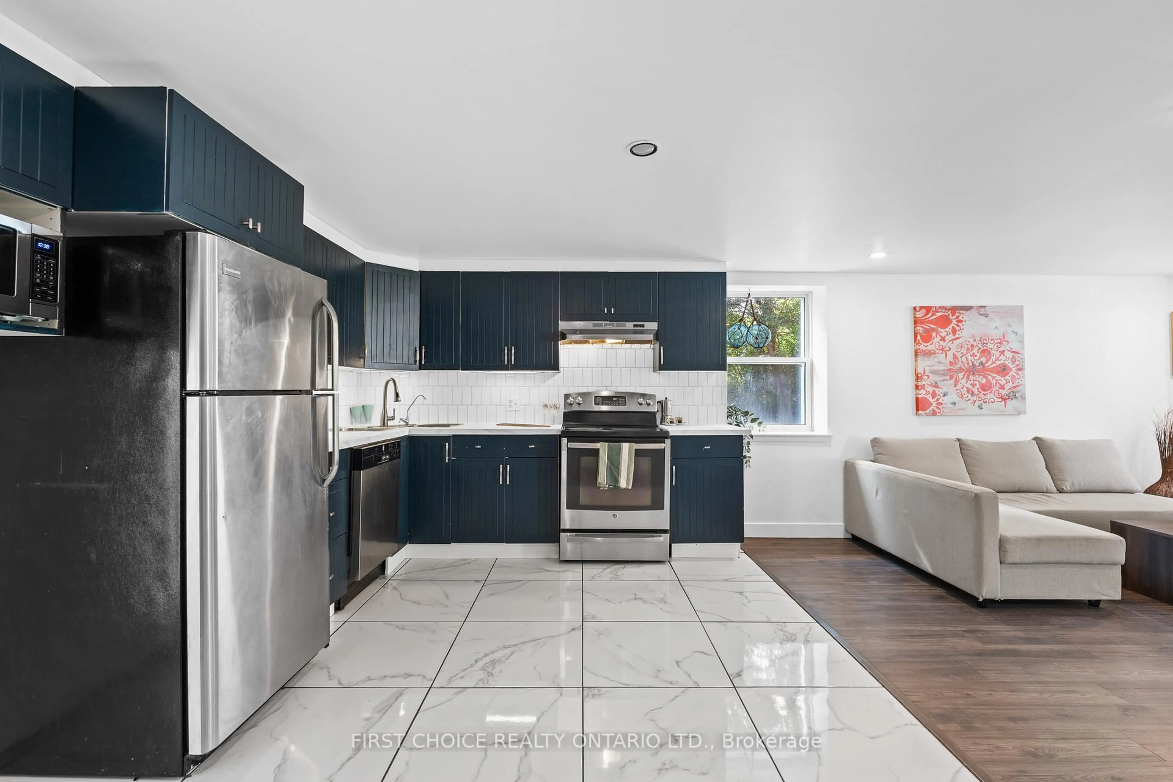 Open concept kitchen, ceramic/tile floor for 10 Campbell Reid Crt, Ottawa Ontario K2K 1X7