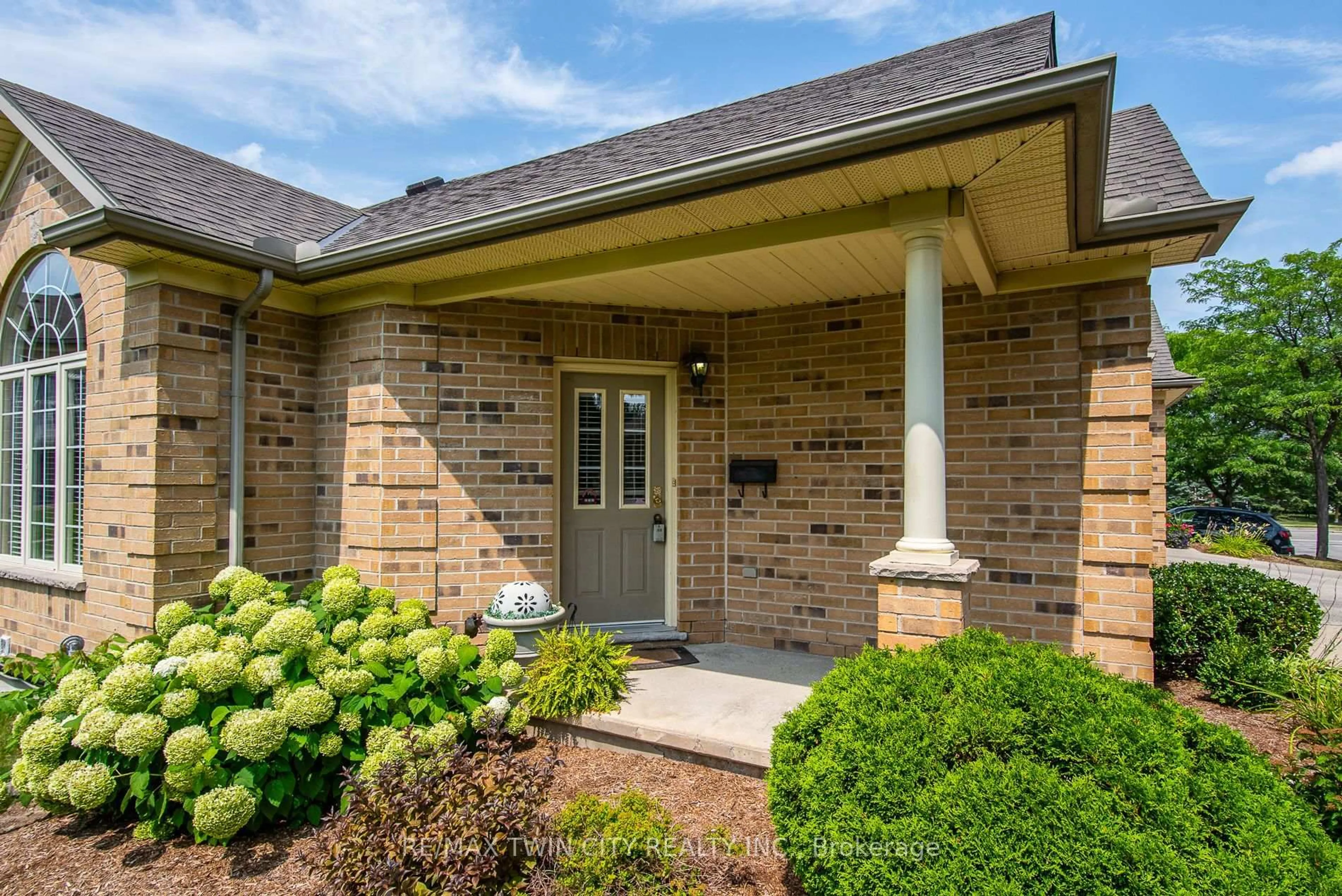 Home with brick exterior material, street for 545 Laurelwood Dr #21, Waterloo Ontario N2V 2R4