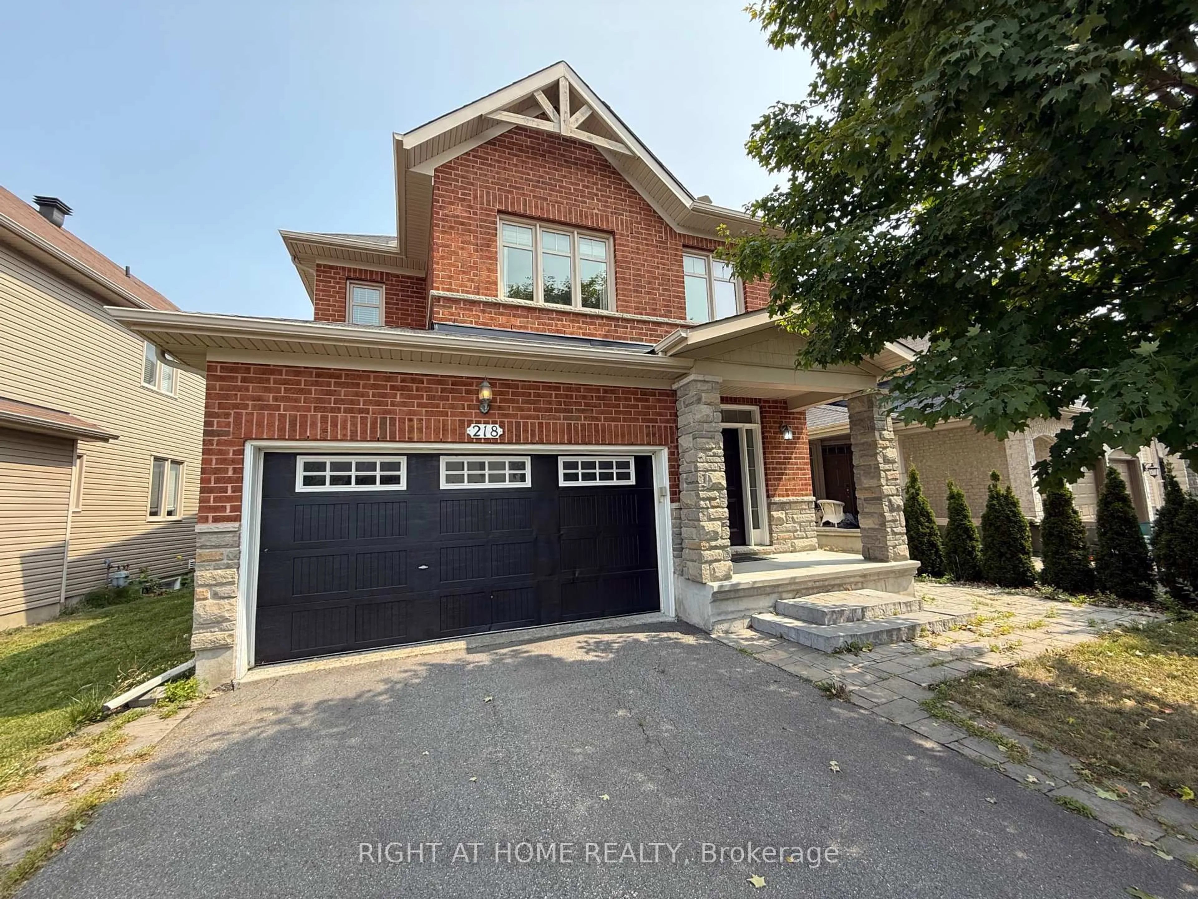 Home with brick exterior material, street for 218 Keyrock Dr, Kanata Ontario K2T 0B4