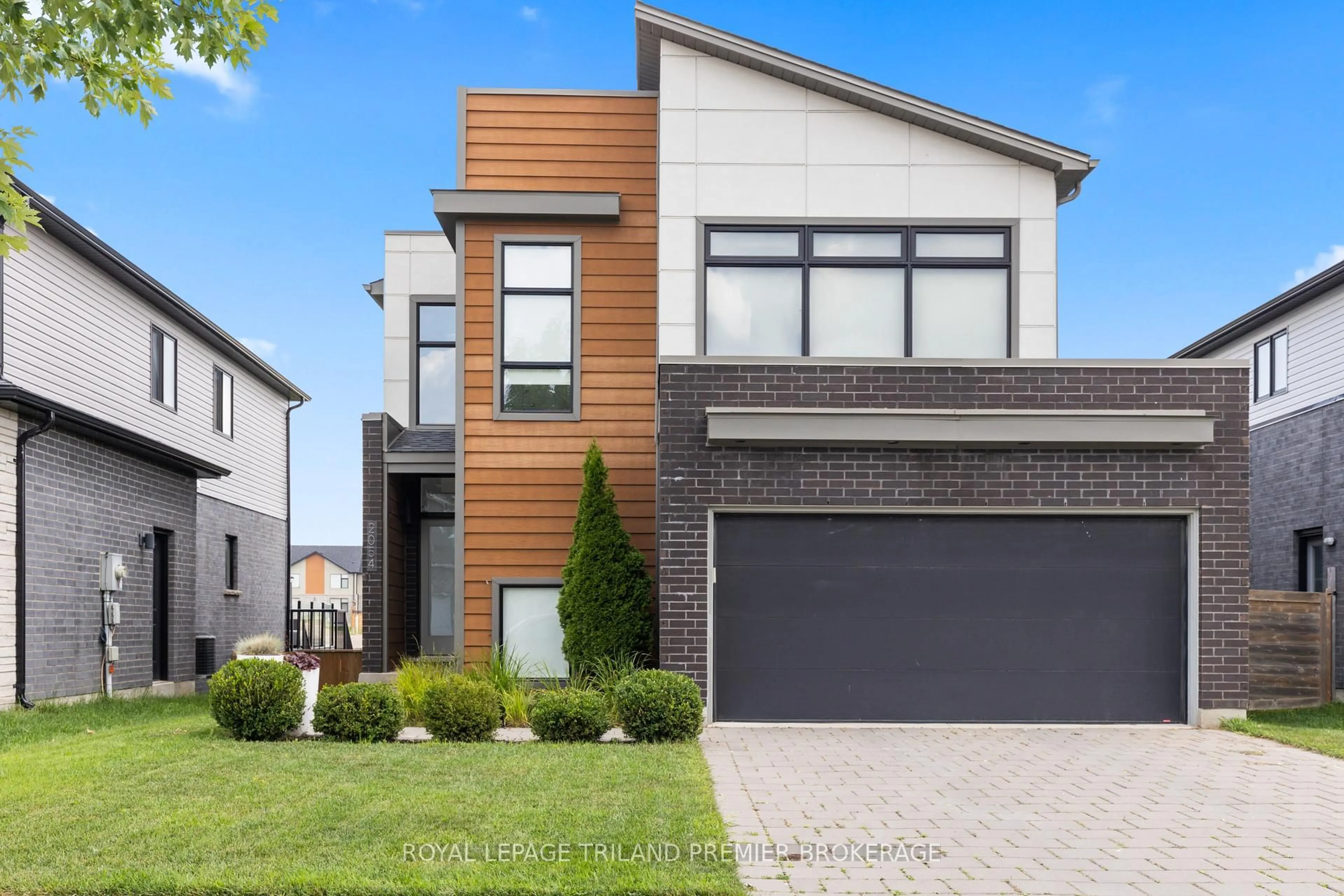 Home with brick exterior material, street for 2054 Wateroak Dr, London North Ontario N6G 5B4