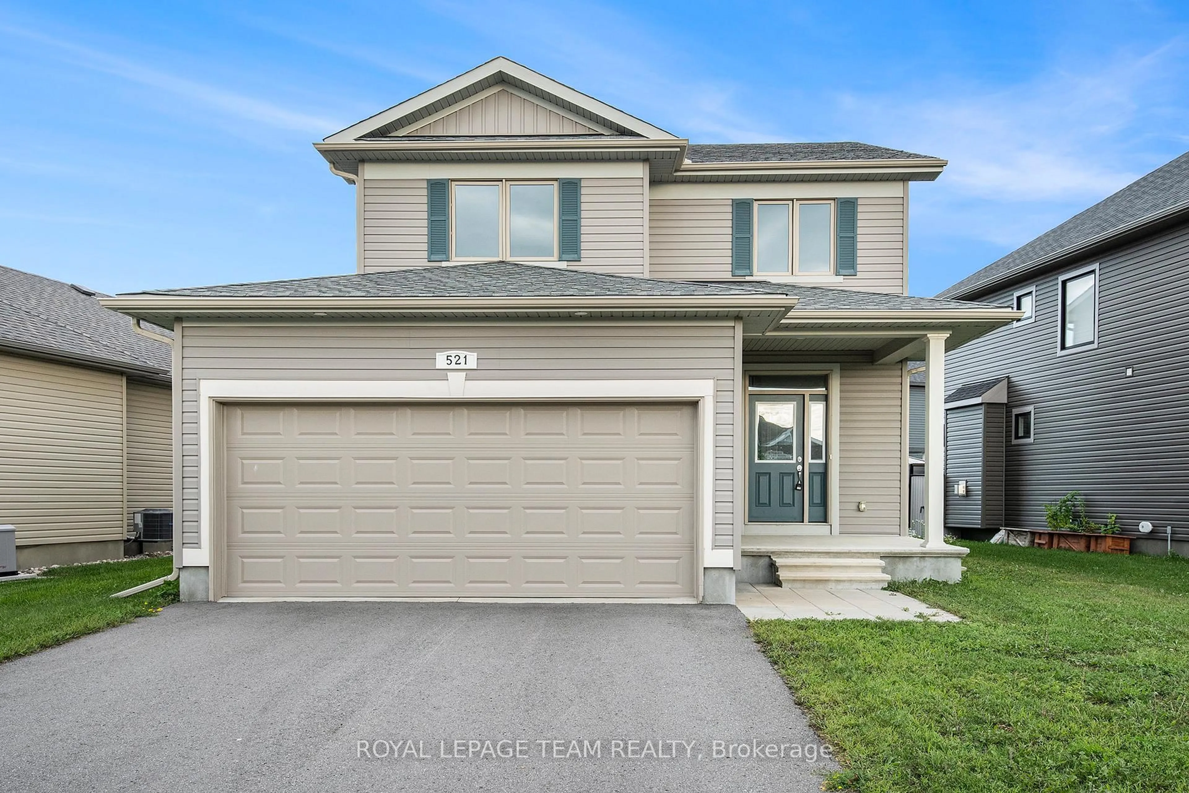 Home with vinyl exterior material, street for 521 Kindred Cres, North Grenville Ontario K0G 1J0