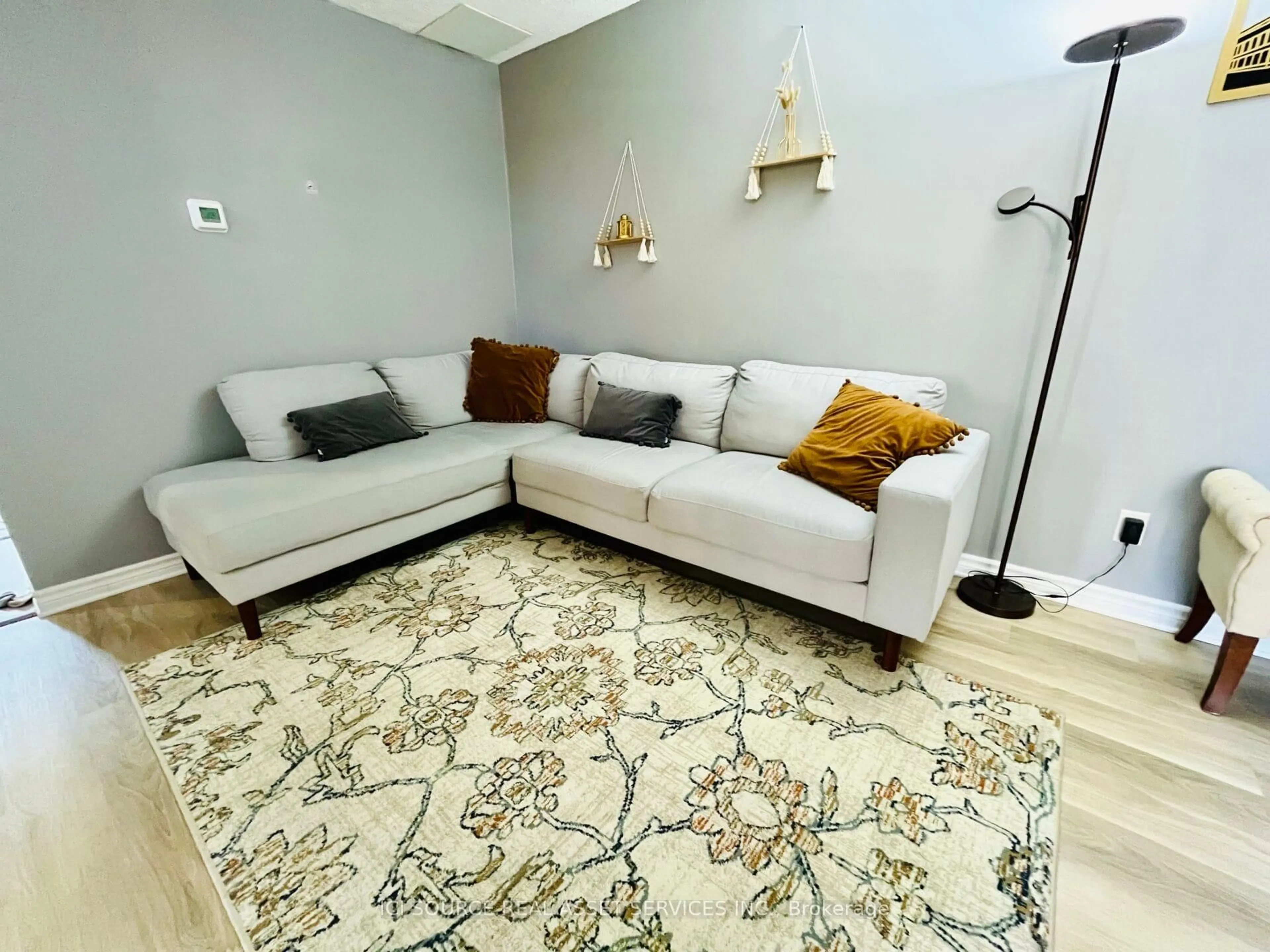 Living room with furniture, carpet floor for 1300 Upper Ottawa St #18, Hamilton Ontario L8W 1M8