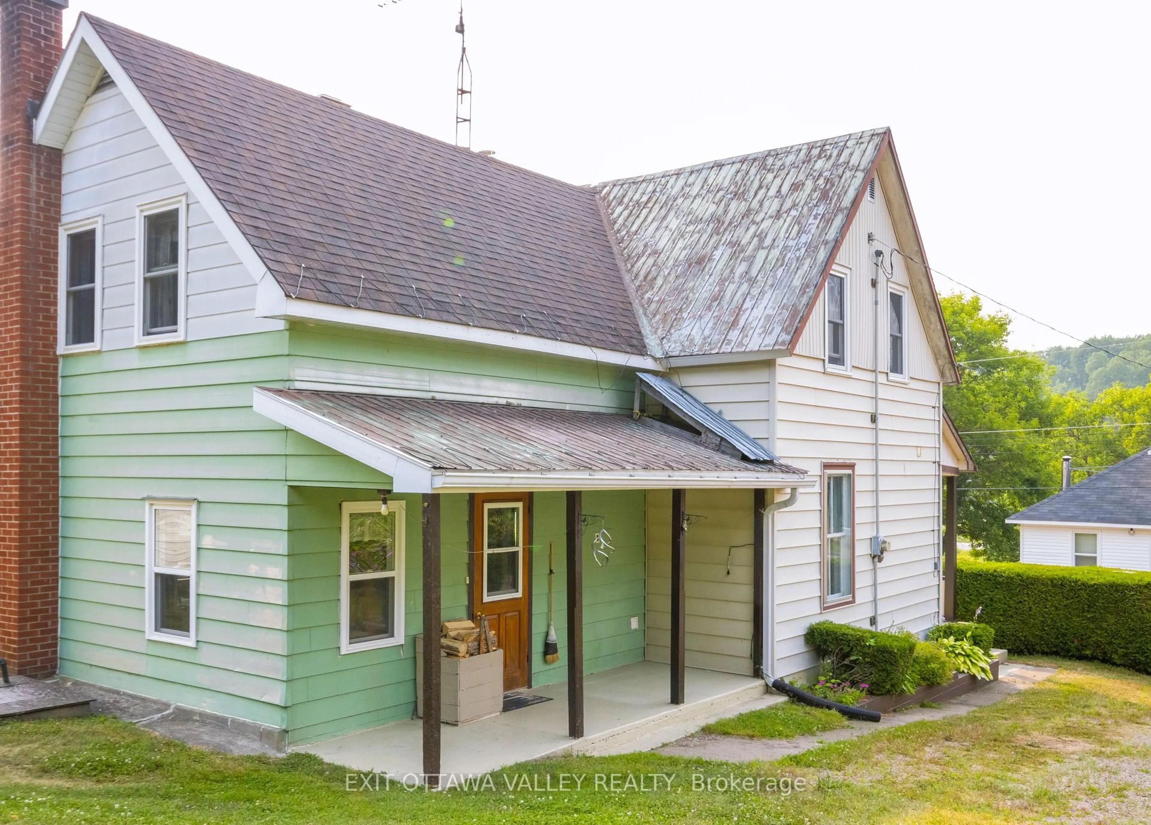 Home with vinyl exterior material, street for 53 Burchat St, Wilno Ontario K0J 2N0