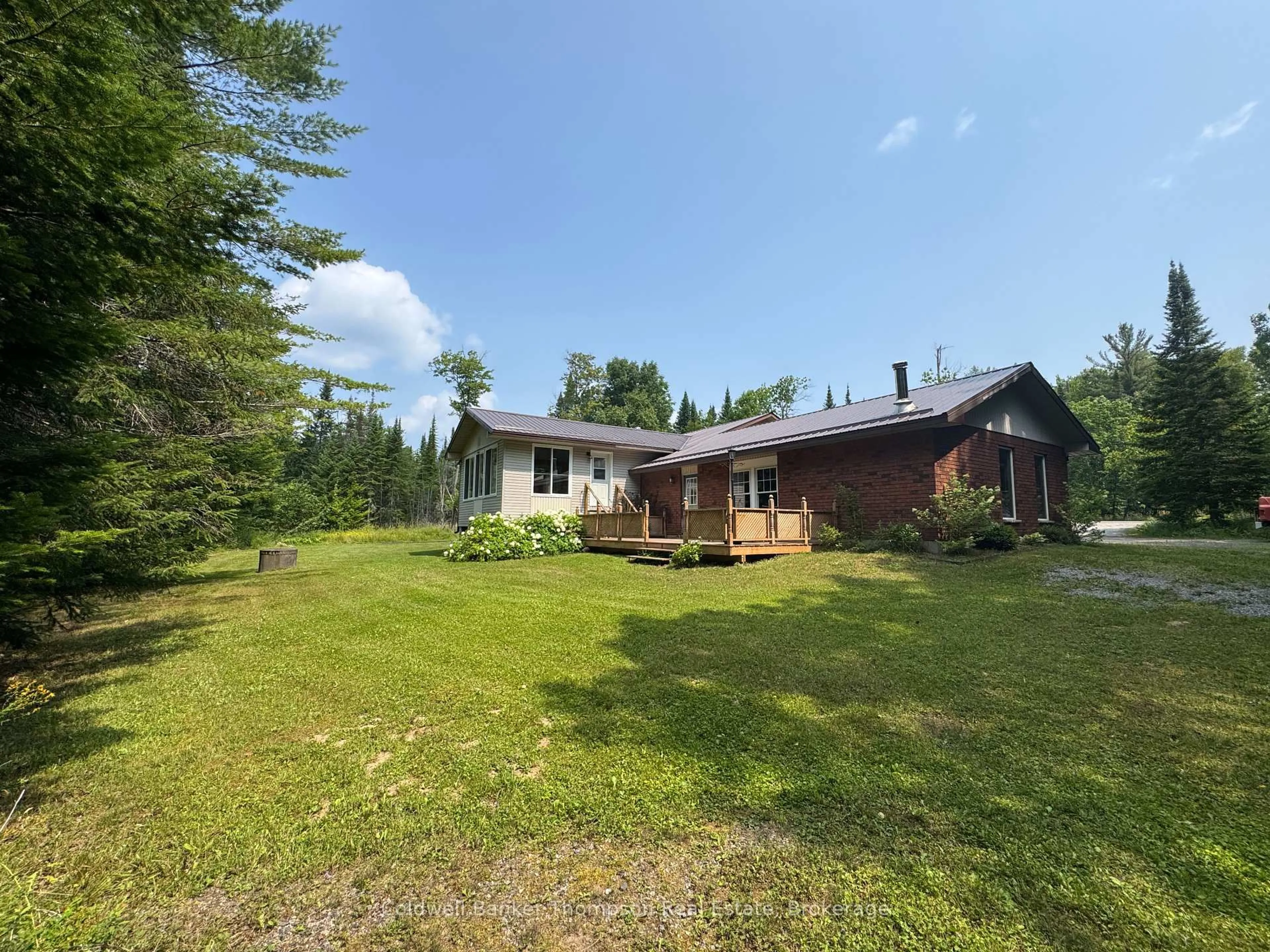 A pic from outside/outdoor area/front of a property/back of a property/a pic from drone, unknown for 2551 Brunel Rd, Huntsville Ontario P1H 2J3