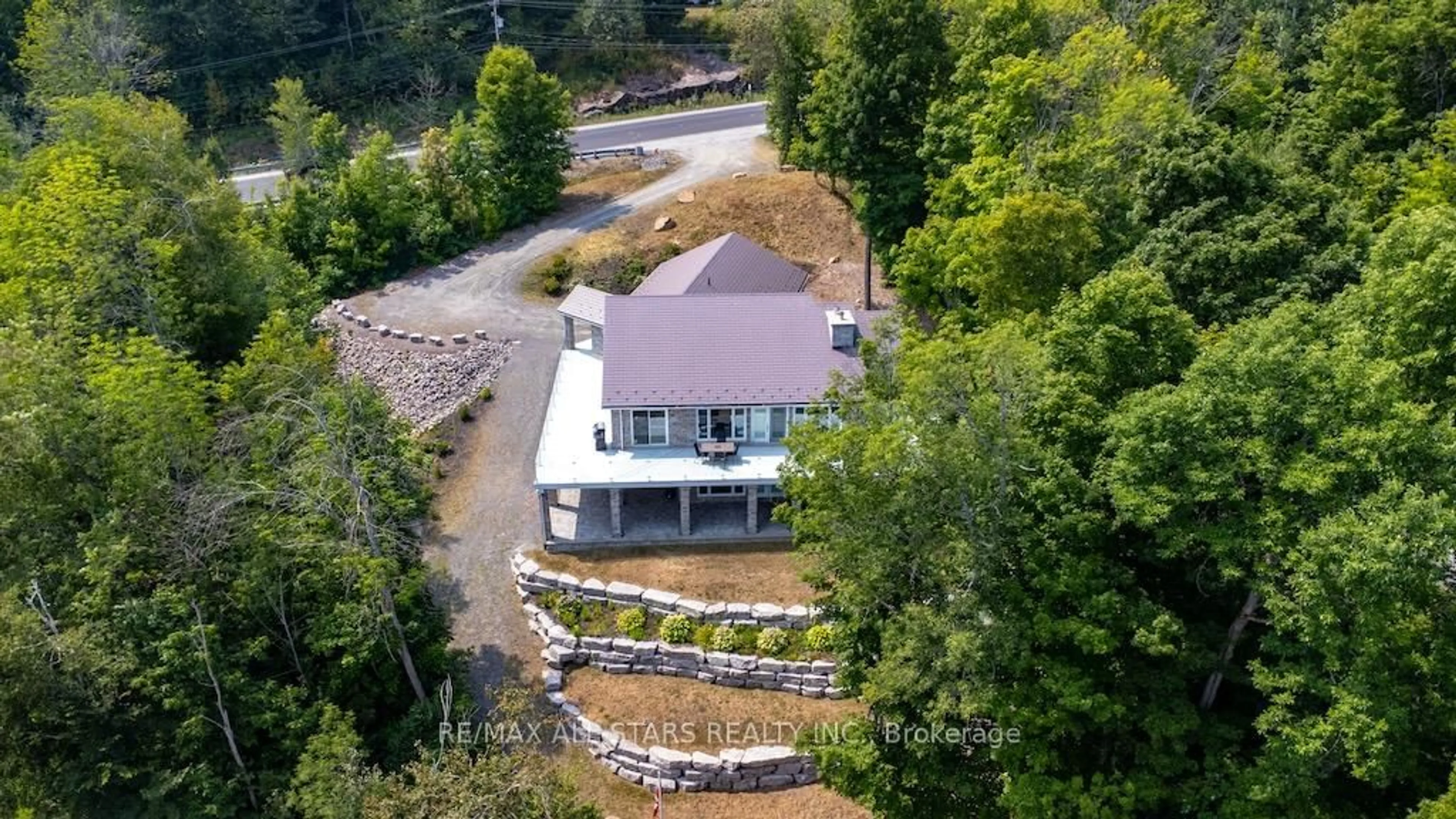 A pic from outside/outdoor area/front of a property/back of a property/a pic from drone, unknown for 13540 Highway 35, Minden Hills Ontario K0M 2K0