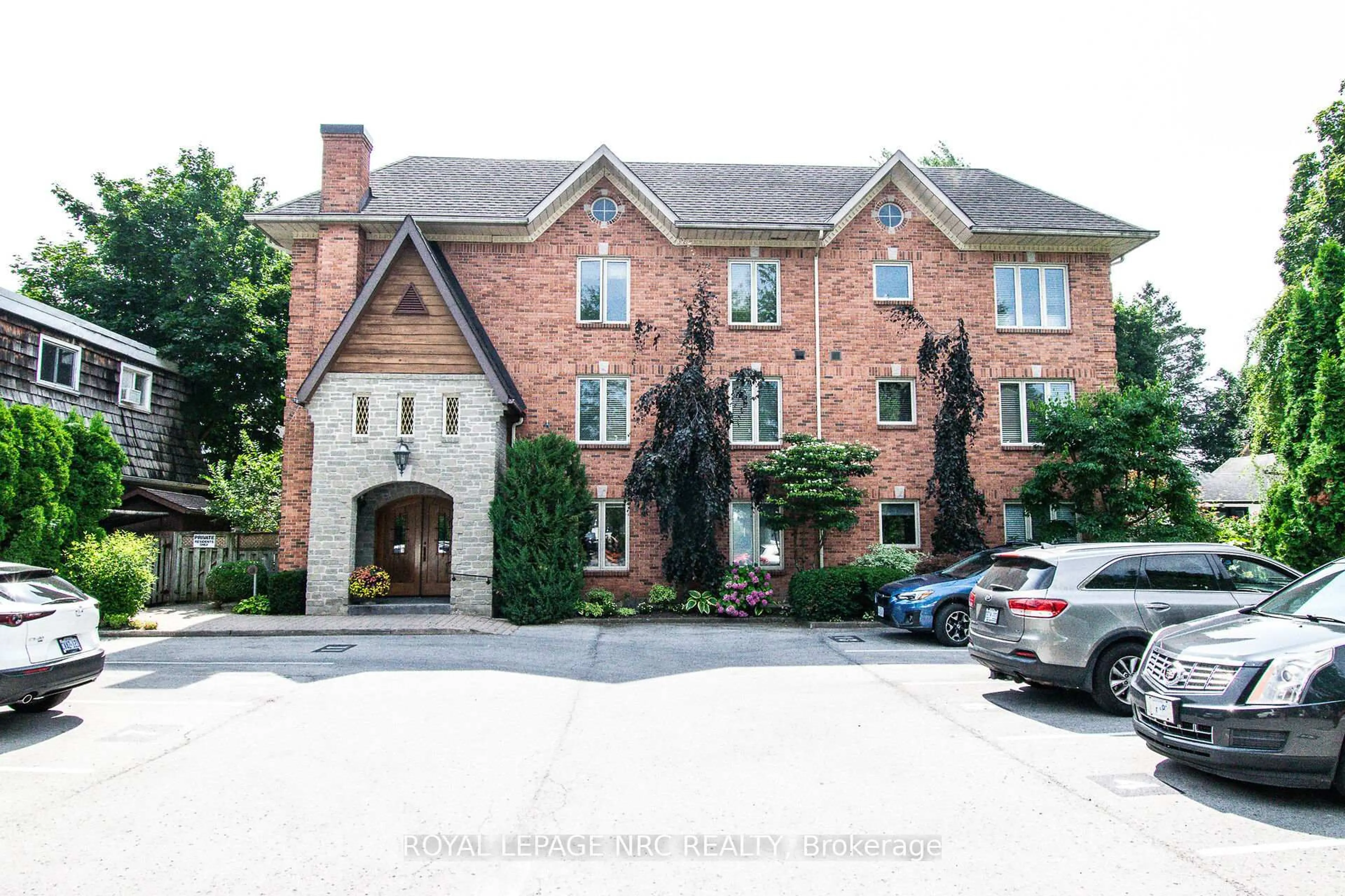 Home with brick exterior material, street for 55 Main St #302, St. Catharines Ontario L2N 4T8
