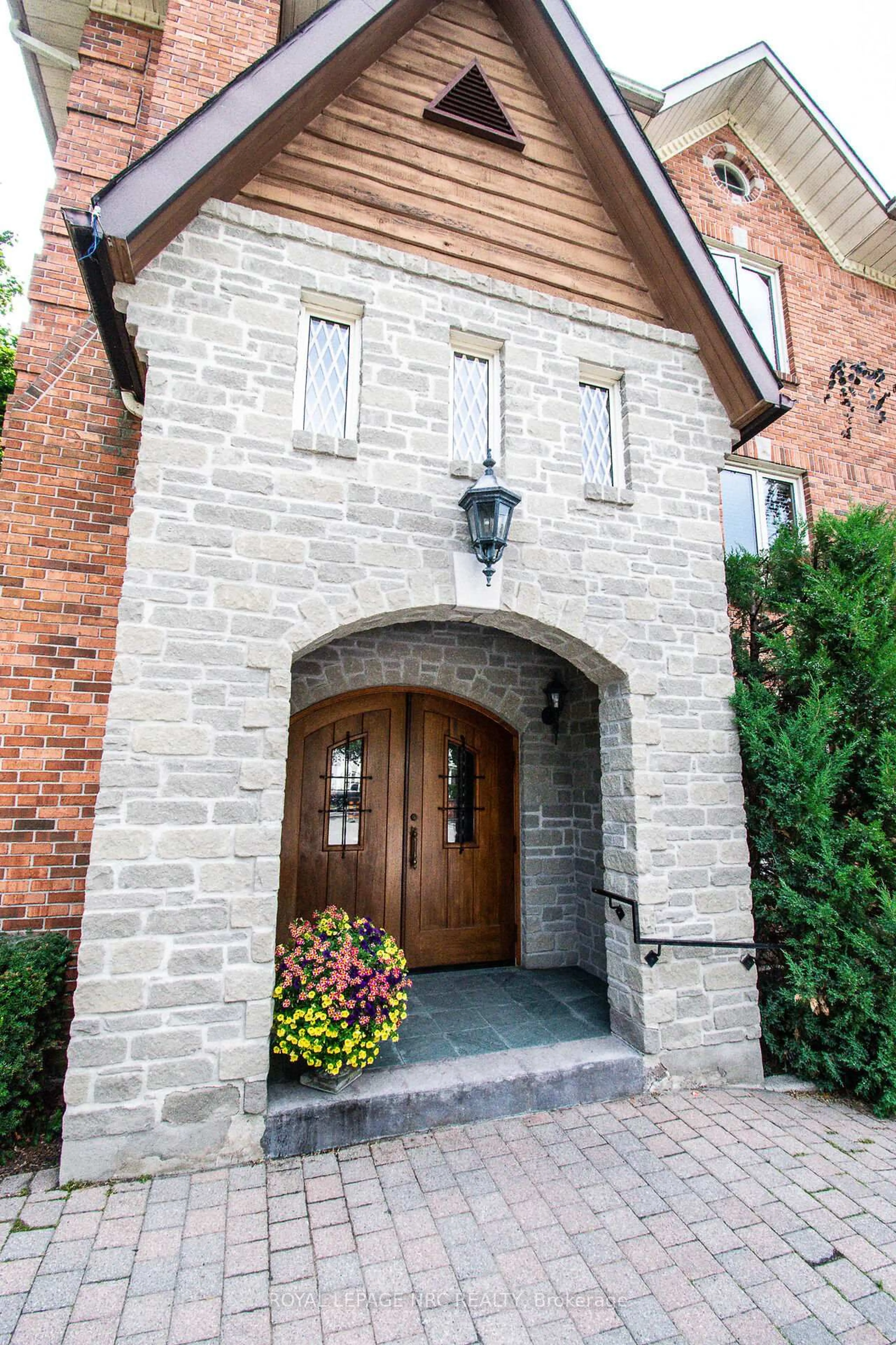 Home with brick exterior material, street for 55 Main St #302, St. Catharines Ontario L2N 4T8