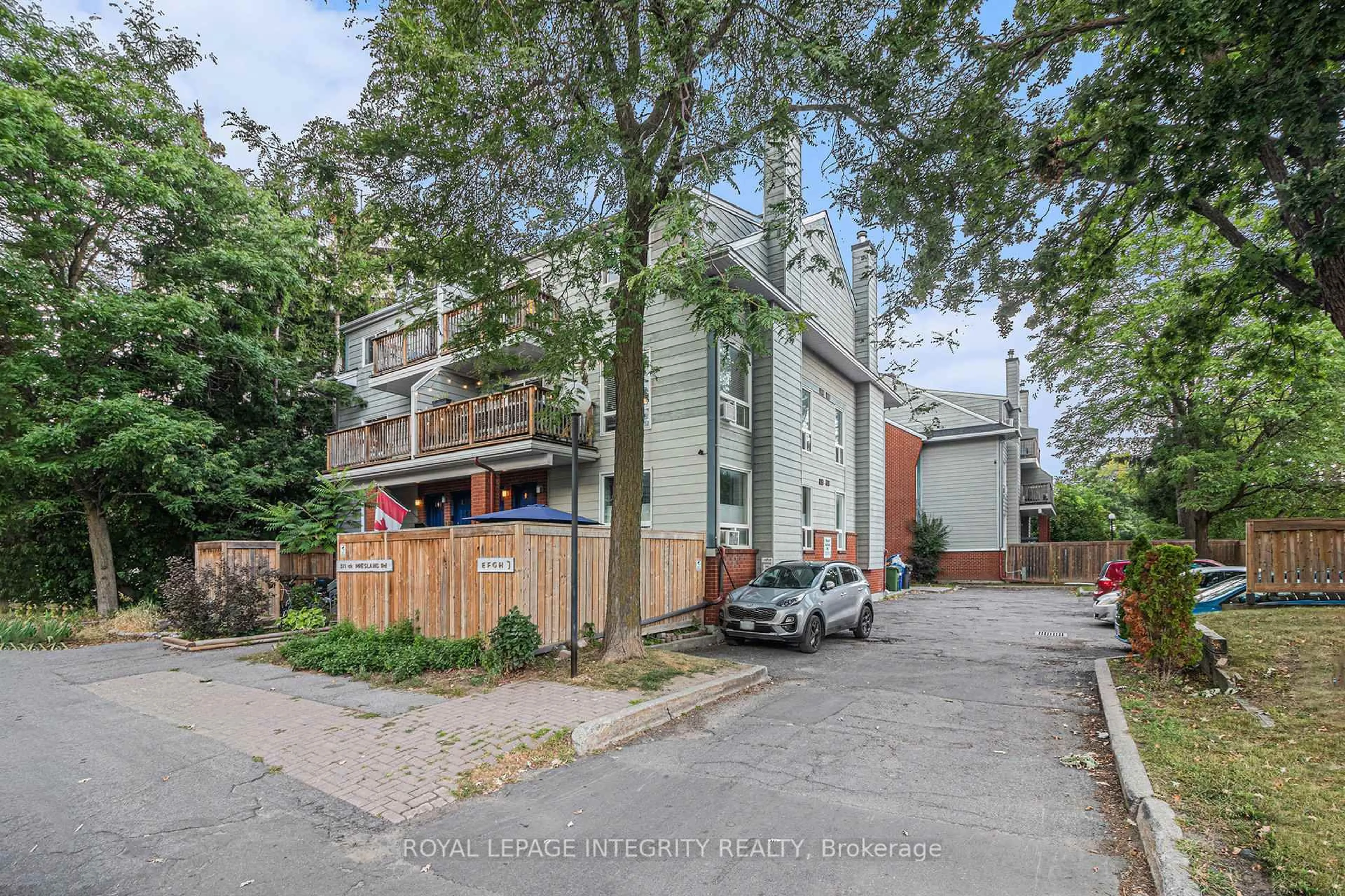 A pic from outside/outdoor area/front of a property/back of a property/a pic from drone, street for 311 Presland Rd #D, Ottawa Ontario K1K 2B6