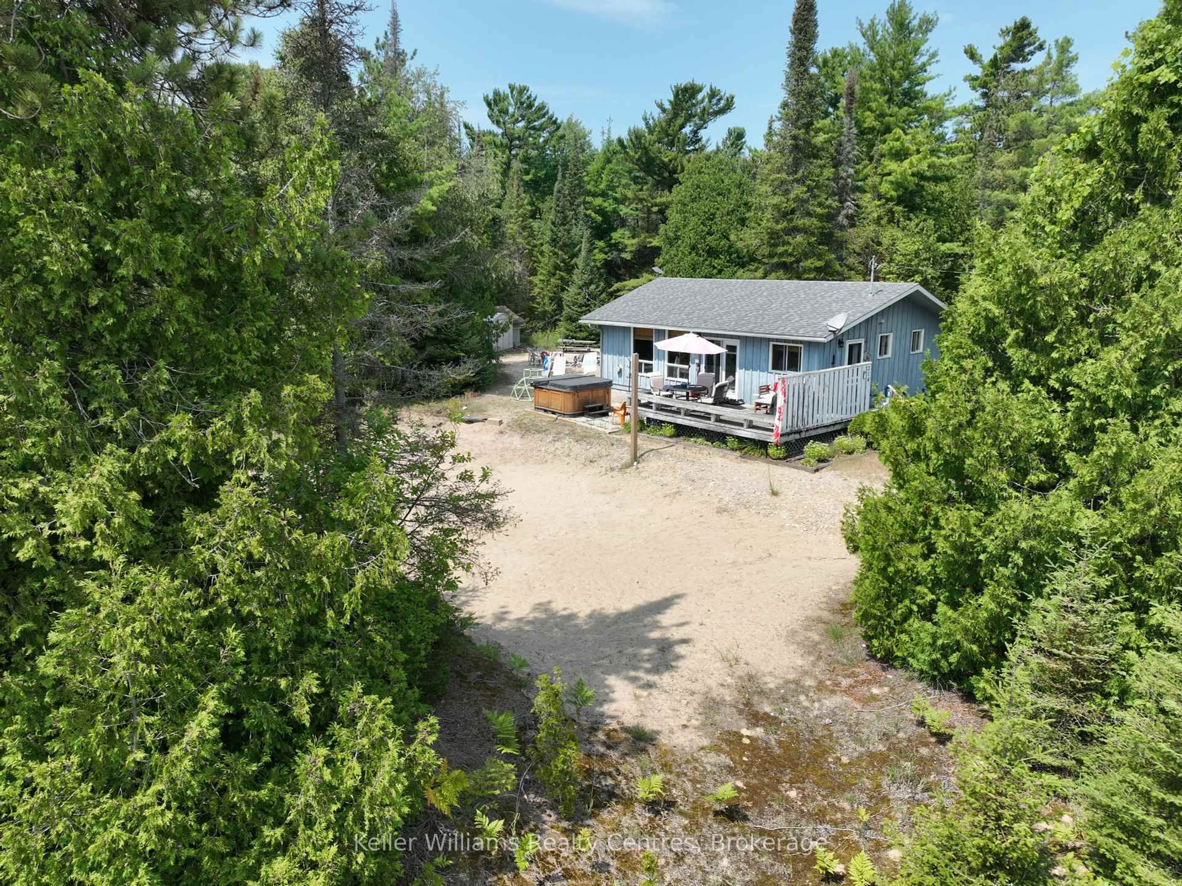 A pic from outside/outdoor area/front of a property/back of a property/a pic from drone, water/lake/river/ocean view for 214 Ogimah Rd, Native Leased Lands Ontario N0H 2T0