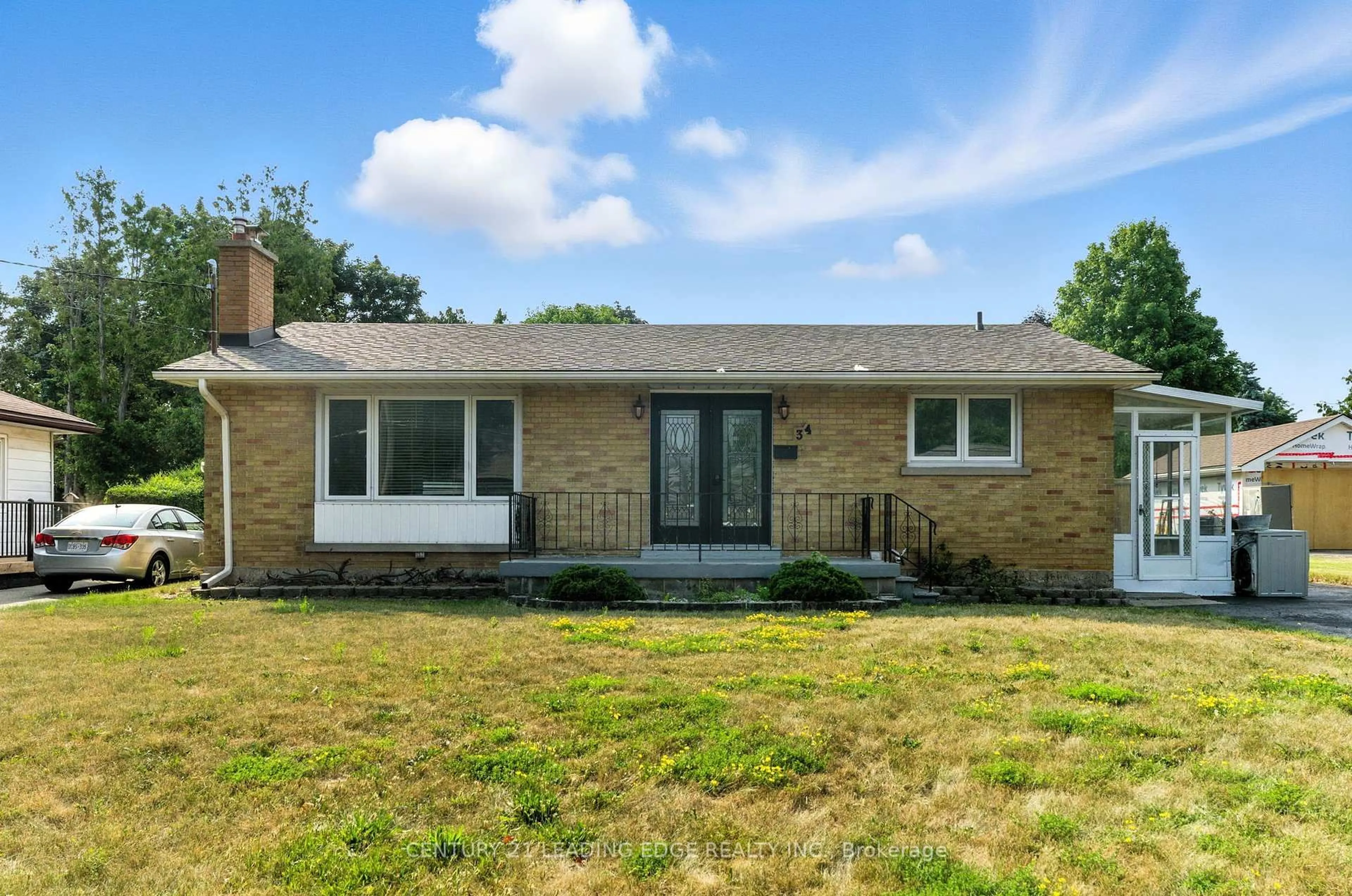 Home with brick exterior material, street for 34 Janet St, Brantford Ontario N3R 3G6
