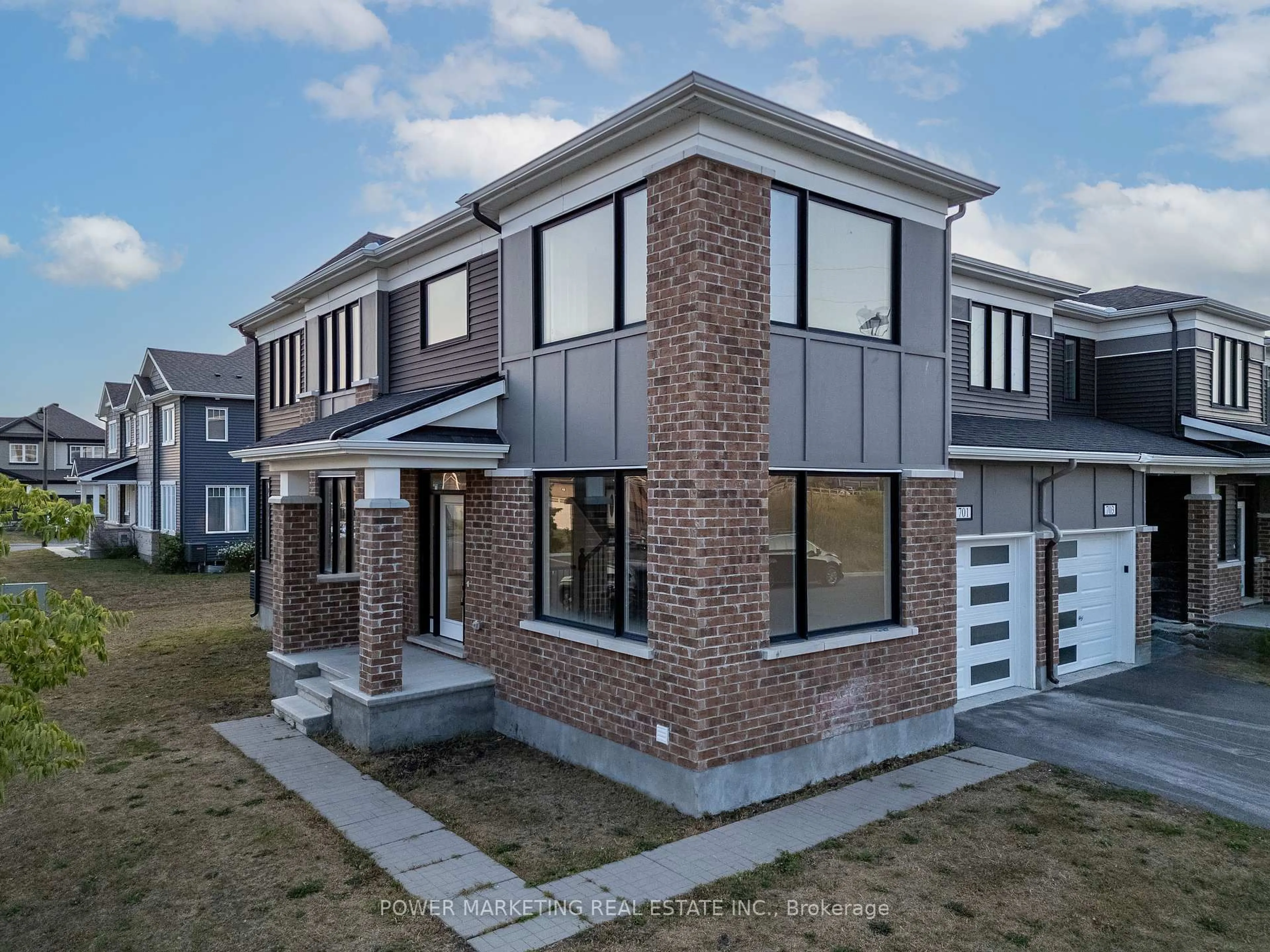 Home with brick exterior material, street for 701 Megrez Way, Ottawa Ontario K2J 6S9