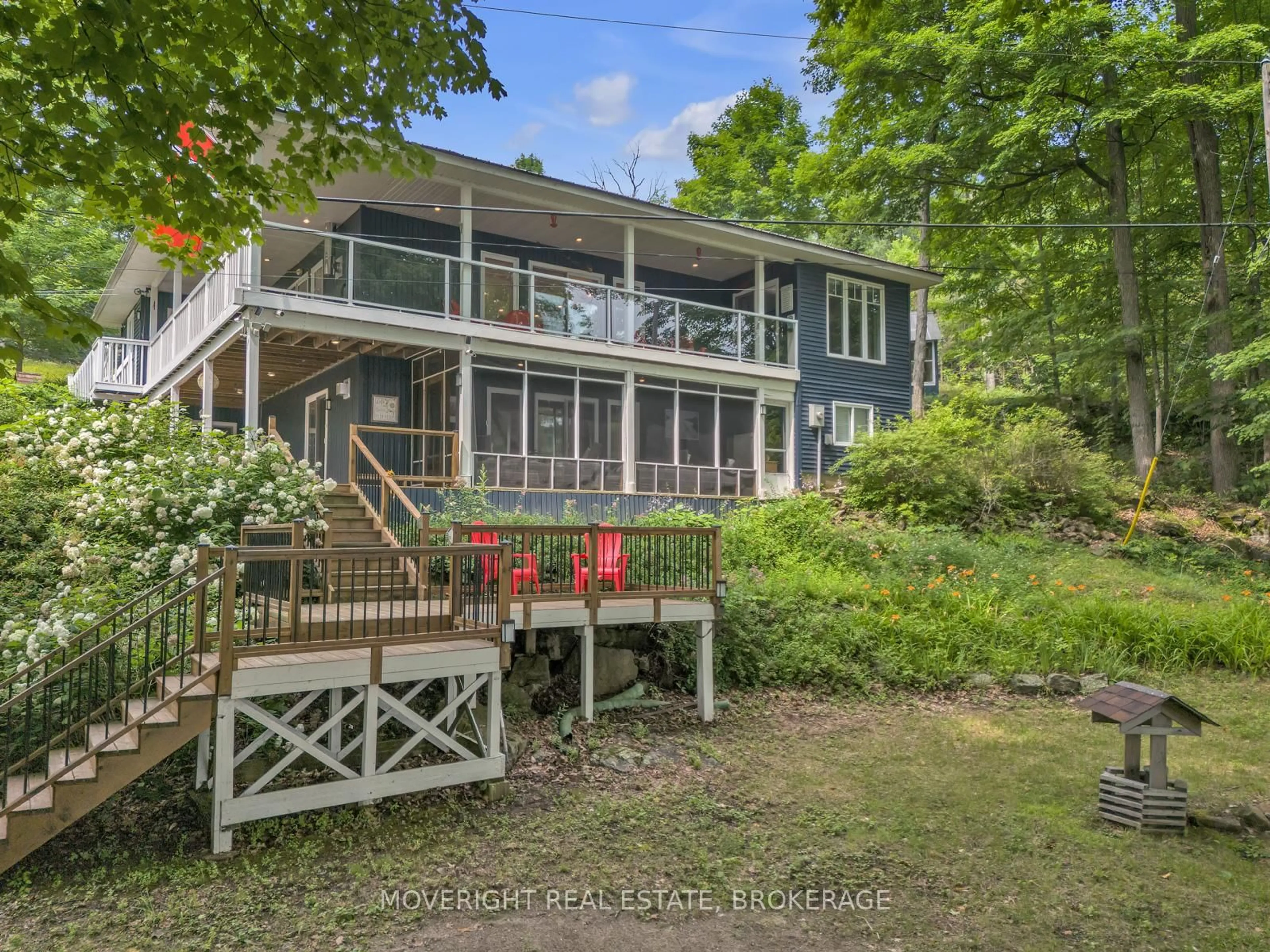 A pic from outside/outdoor area/front of a property/back of a property/a pic from drone, water/lake/river/ocean view for 101 Thistle Lane, Maberly Ontario K0H 2B0