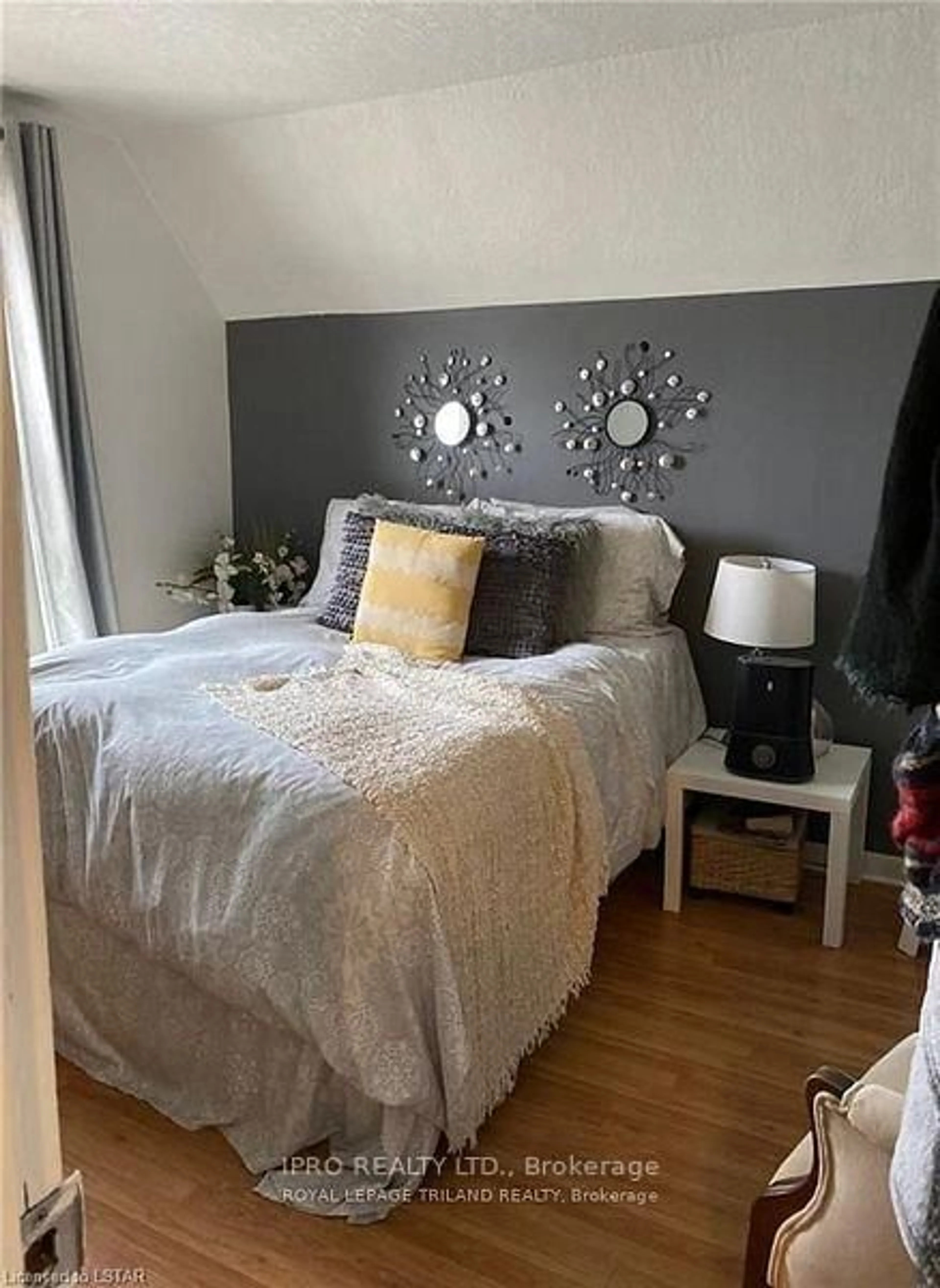 Bedroom with bed, wood/laminate floor for 332 Colborne St, Central Elgin Ontario N5L 1B3