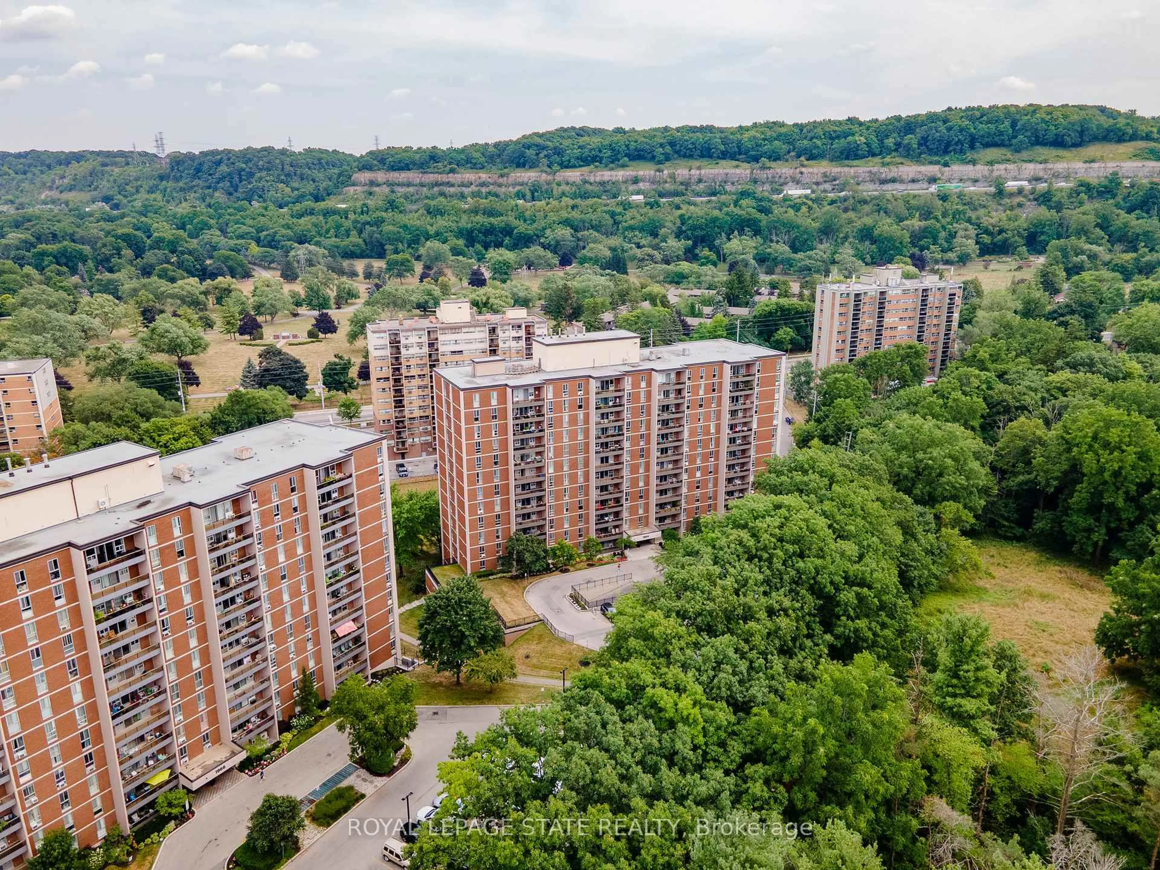 A pic from outside/outdoor area/front of a property/back of a property/a pic from drone, city buildings view from balcony for 1964 Main St #707, Hamilton Ontario L8S 1J5
