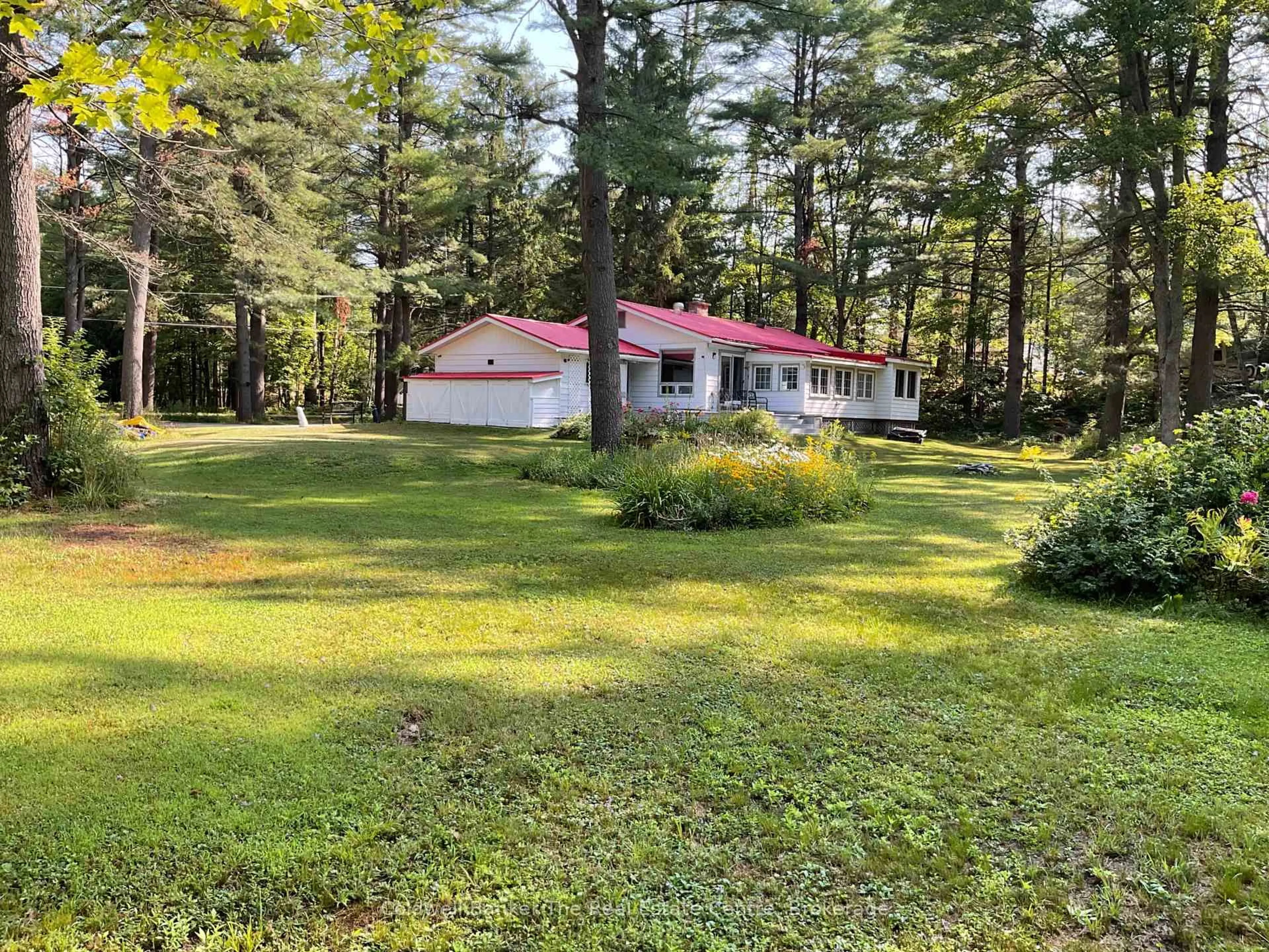 A pic from outside/outdoor area/front of a property/back of a property/a pic from drone, forest/trees view for 1060 Kahshe Lake Rd, Gravenhurst Ontario P0E 1G0