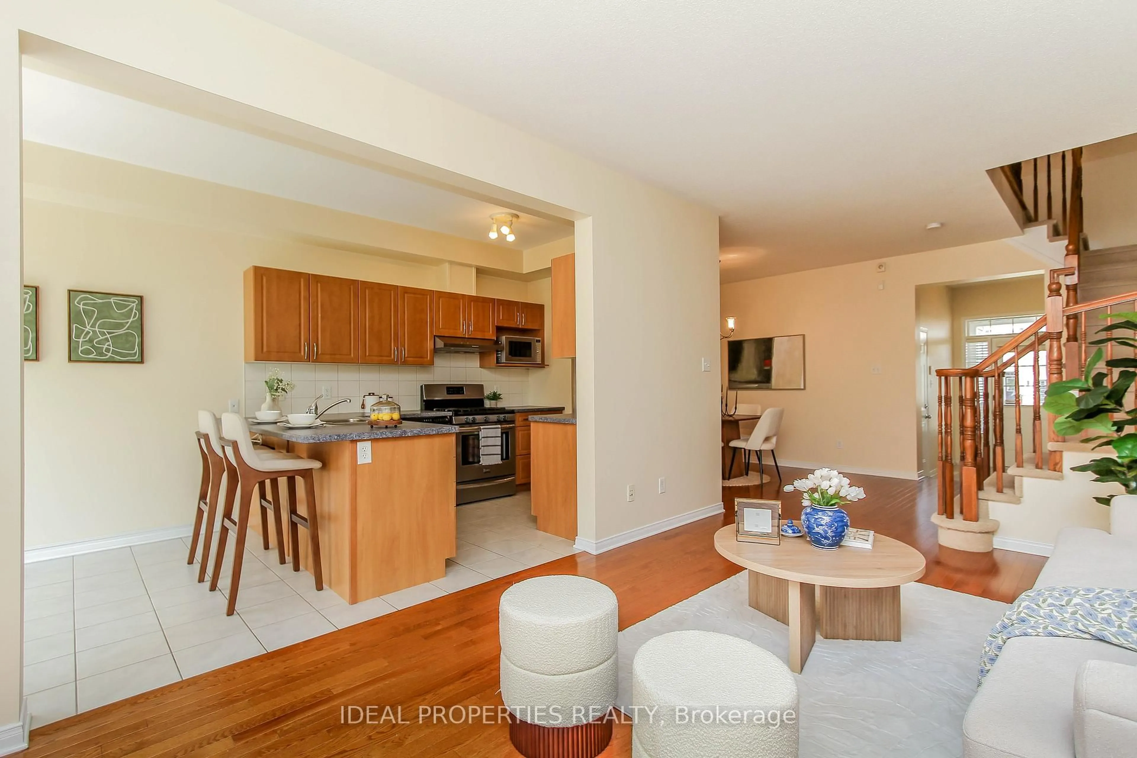 Open concept kitchen, wood/laminate floor for 565 Pepperville Cres, Ottawa Ontario K2M 0E6