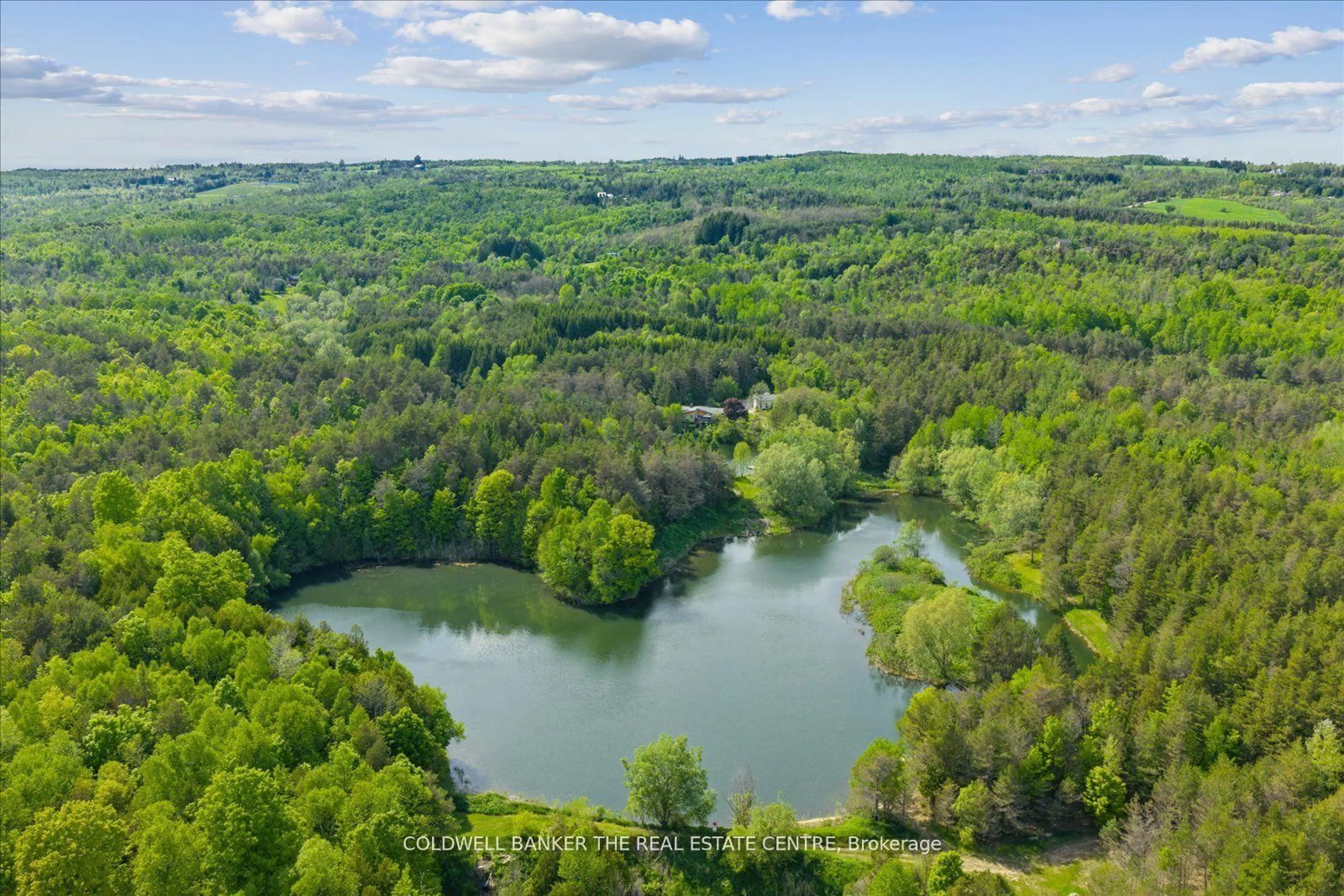 A pic from outside/outdoor area/front of a property/back of a property/a pic from drone, water/lake/river/ocean view for 798213 3rd Line, Mulmur Ontario L9V 0H7