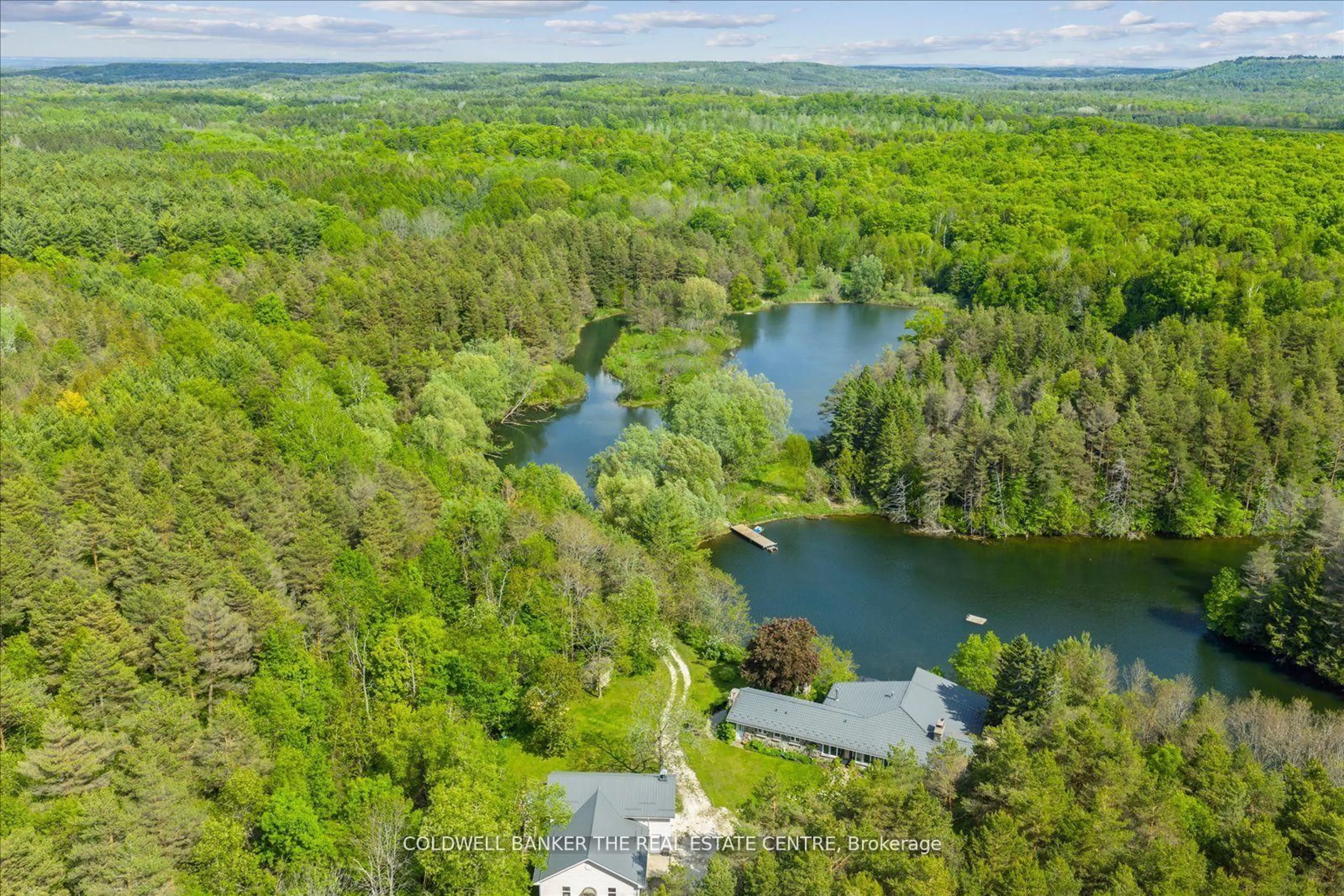 A pic from outside/outdoor area/front of a property/back of a property/a pic from drone, water/lake/river/ocean view for 798213 3rd Line, Mulmur Ontario L9V 0H7