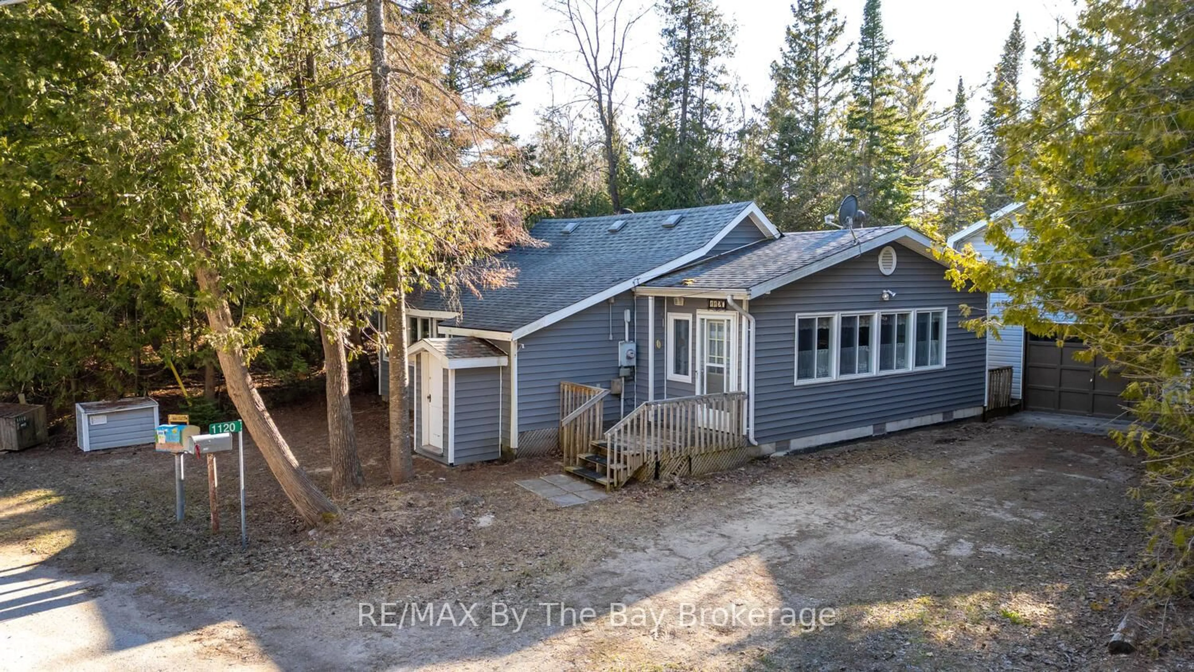 A pic from outside/outdoor area/front of a property/back of a property/a pic from drone, street for 1120 King Edward Ave, South Bruce Peninsula Ontario N0H 2G0