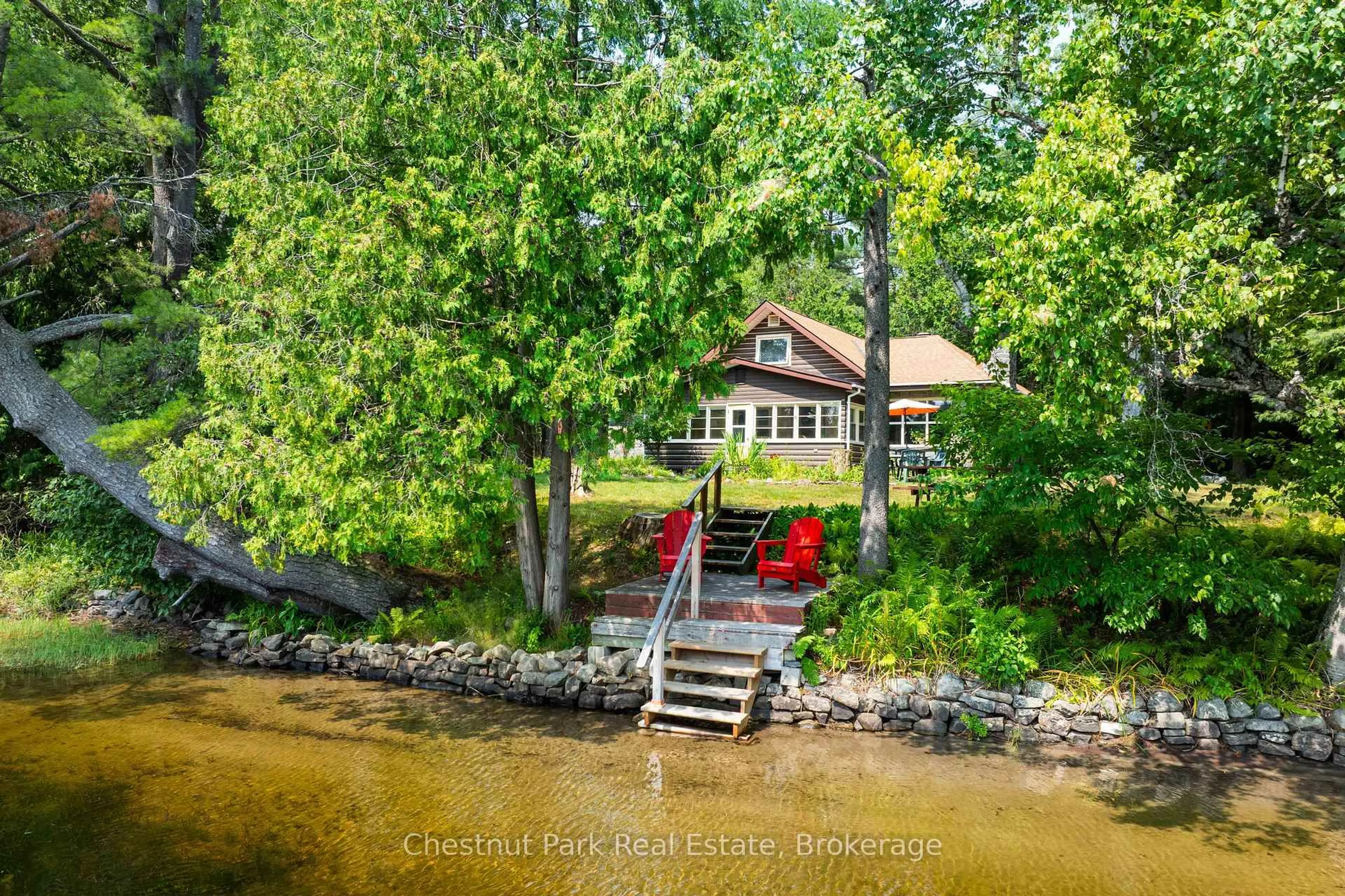A pic from outside/outdoor area/front of a property/back of a property/a pic from drone, water/lake/river/ocean view for 66 Brofoco Dr, Bracebridge Ontario P1L 1C9
