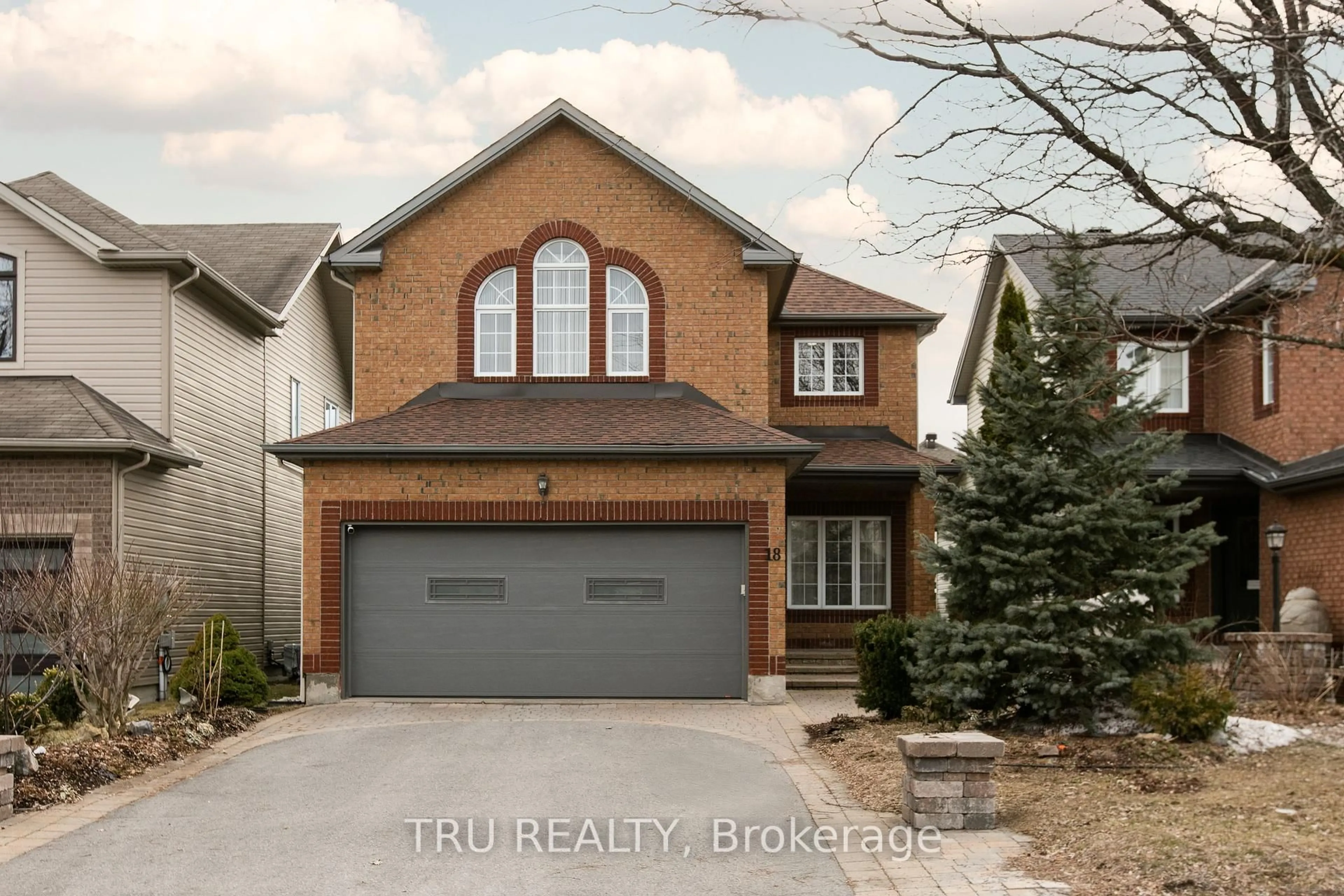 Home with brick exterior material, street for 18 Gannet St, Ottawa Ontario K1K 4T7