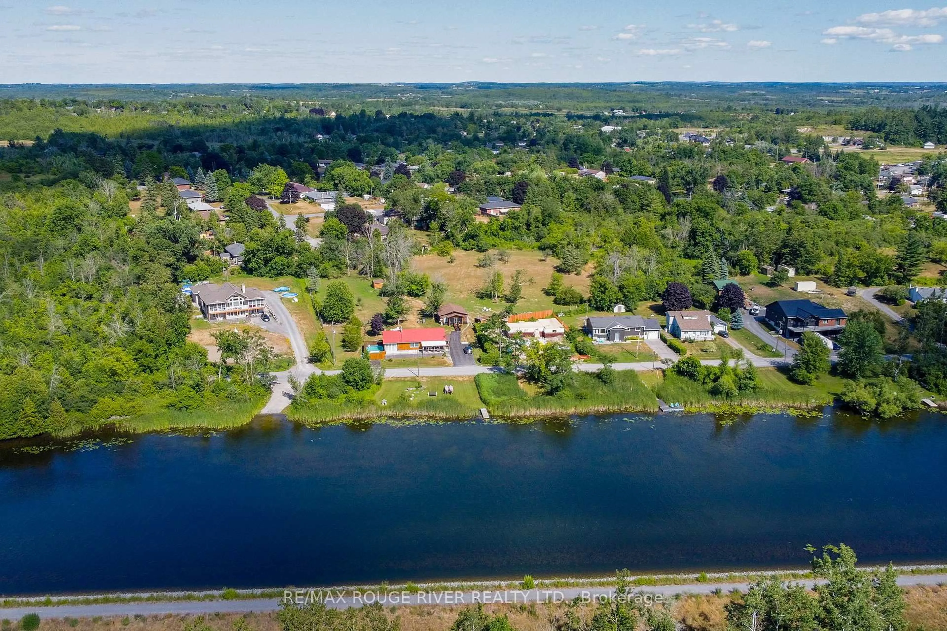 A pic from outside/outdoor area/front of a property/back of a property/a pic from drone, water/lake/river/ocean view for 810 Canal Rd, Douro-Dummer Ontario K9L 1A1