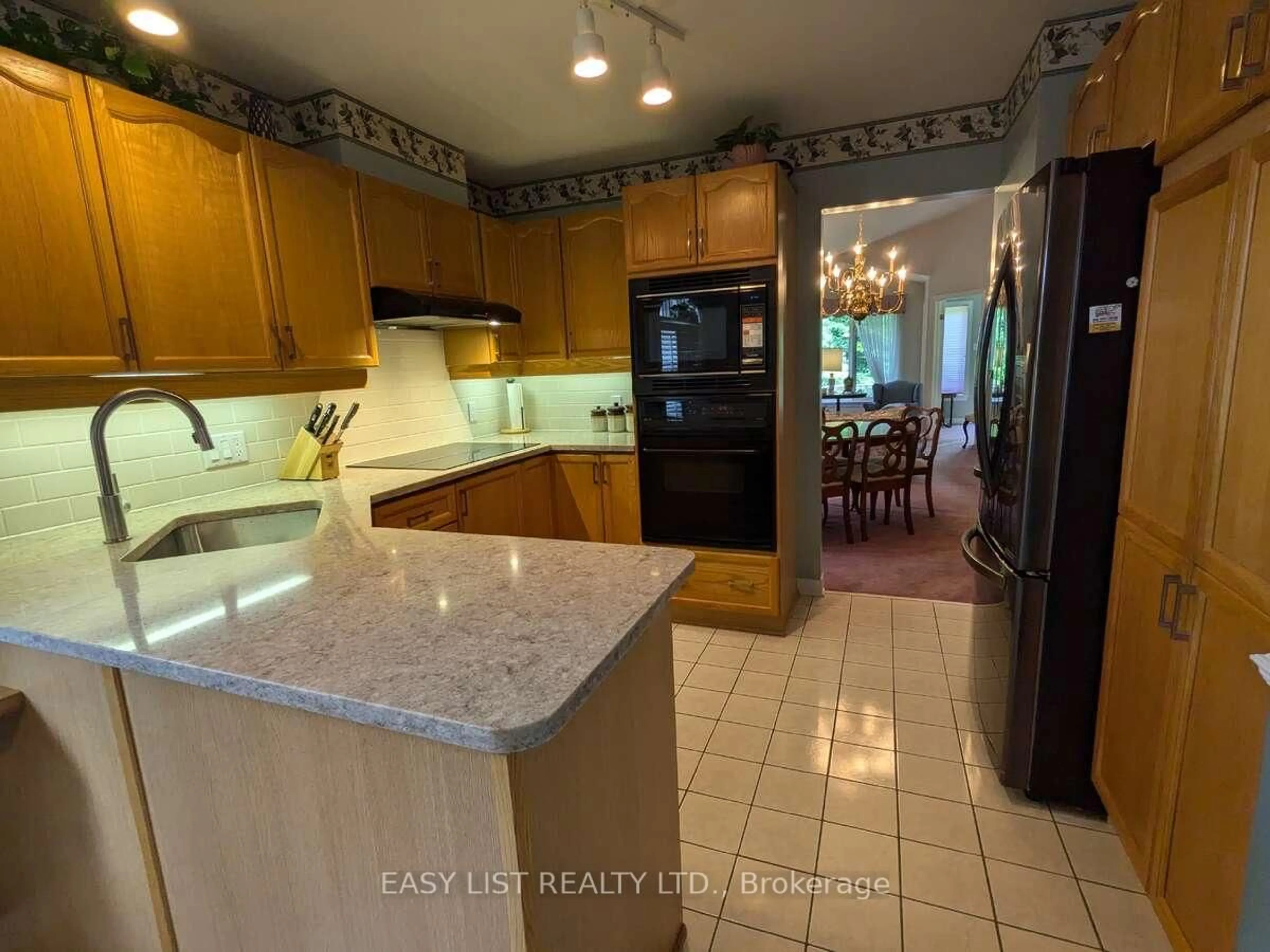 Open concept kitchen, ceramic/tile floor for 57 Goldfinch Dr, Ottawa Ontario K2M 2P5