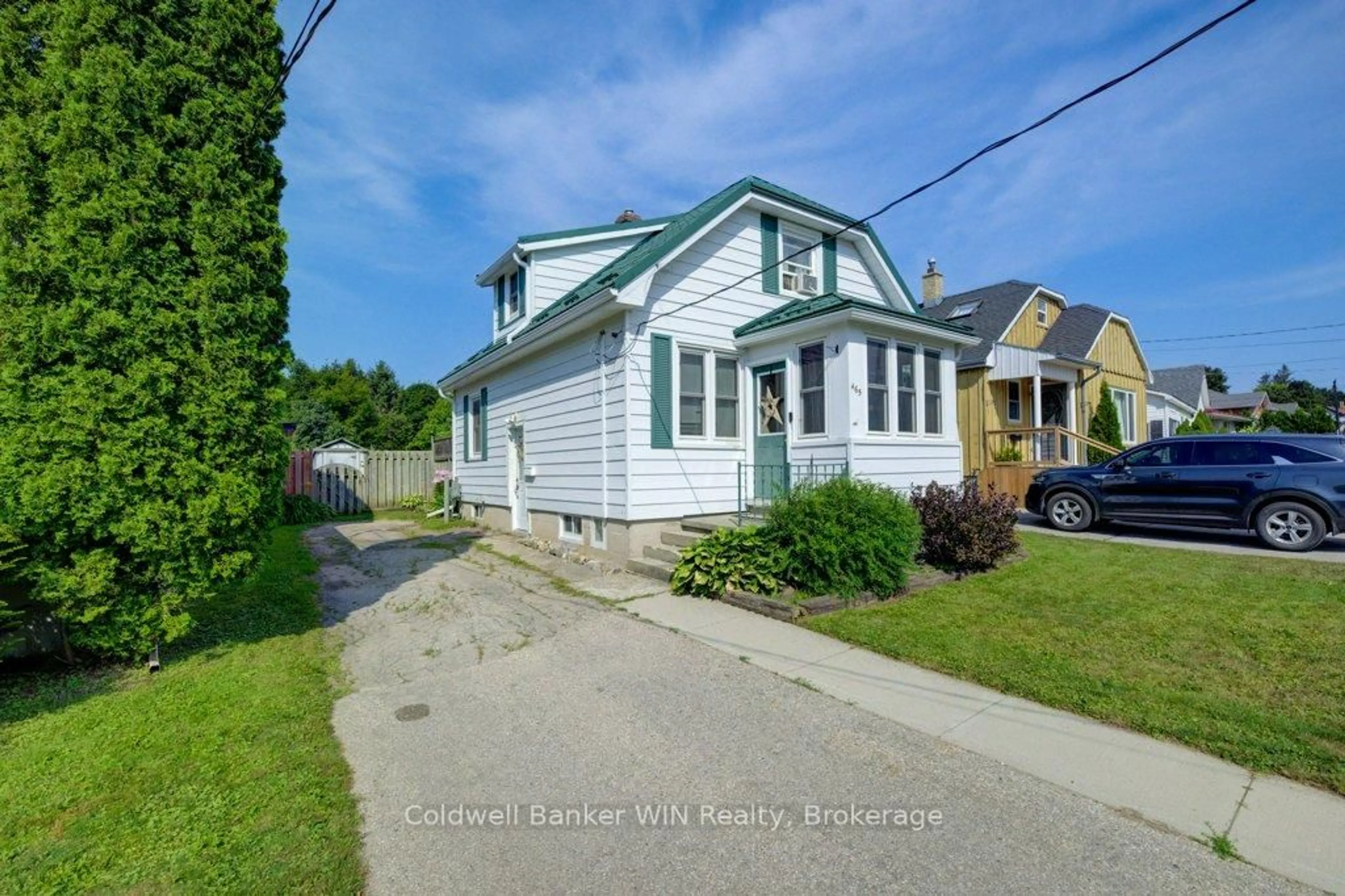 A pic from outside/outdoor area/front of a property/back of a property/a pic from drone, street for 465 John St, Wellington North Ontario N0G 2L3