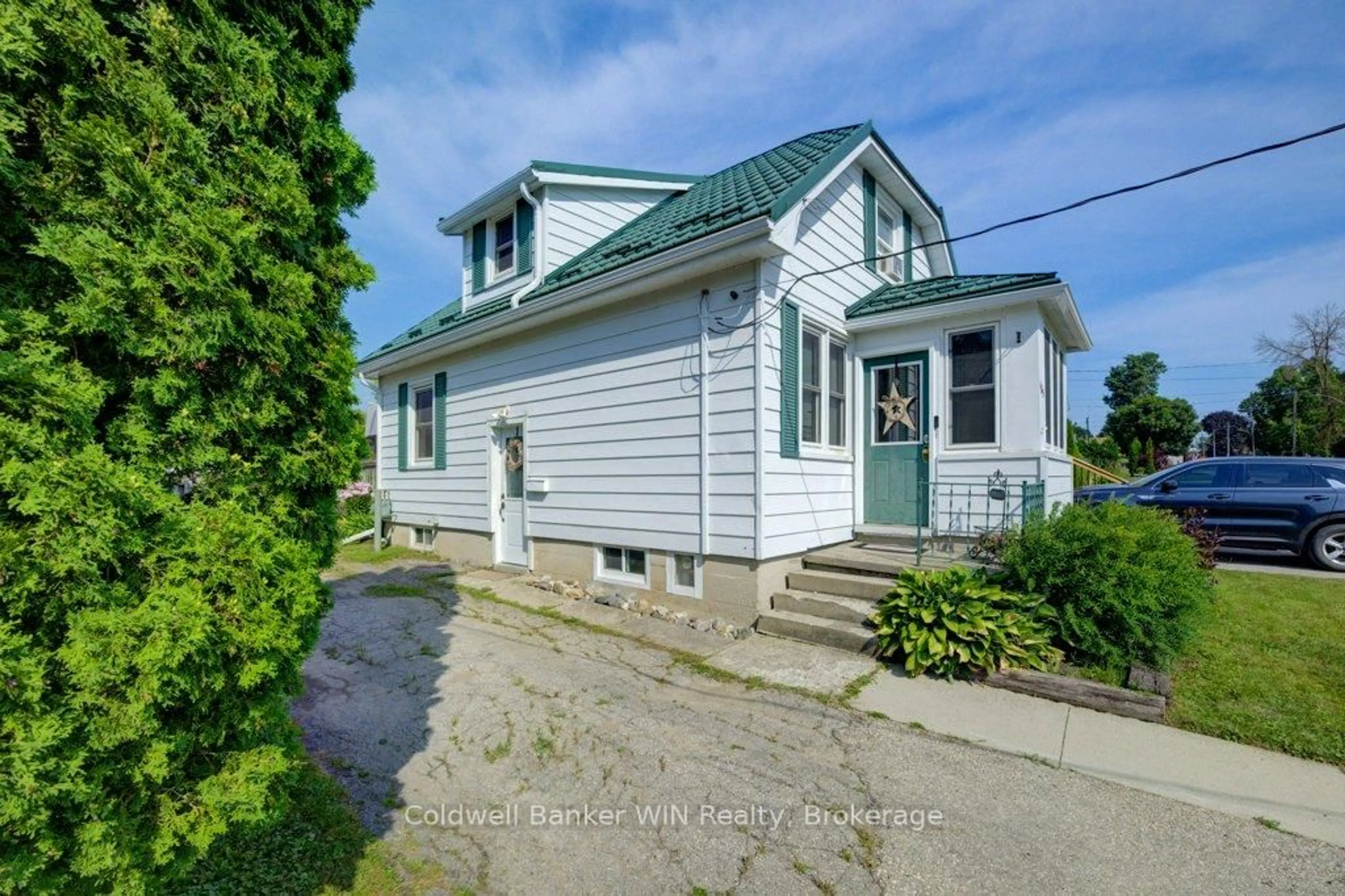 A pic from outside/outdoor area/front of a property/back of a property/a pic from drone, street for 465 John St, Wellington North Ontario N0G 2L3