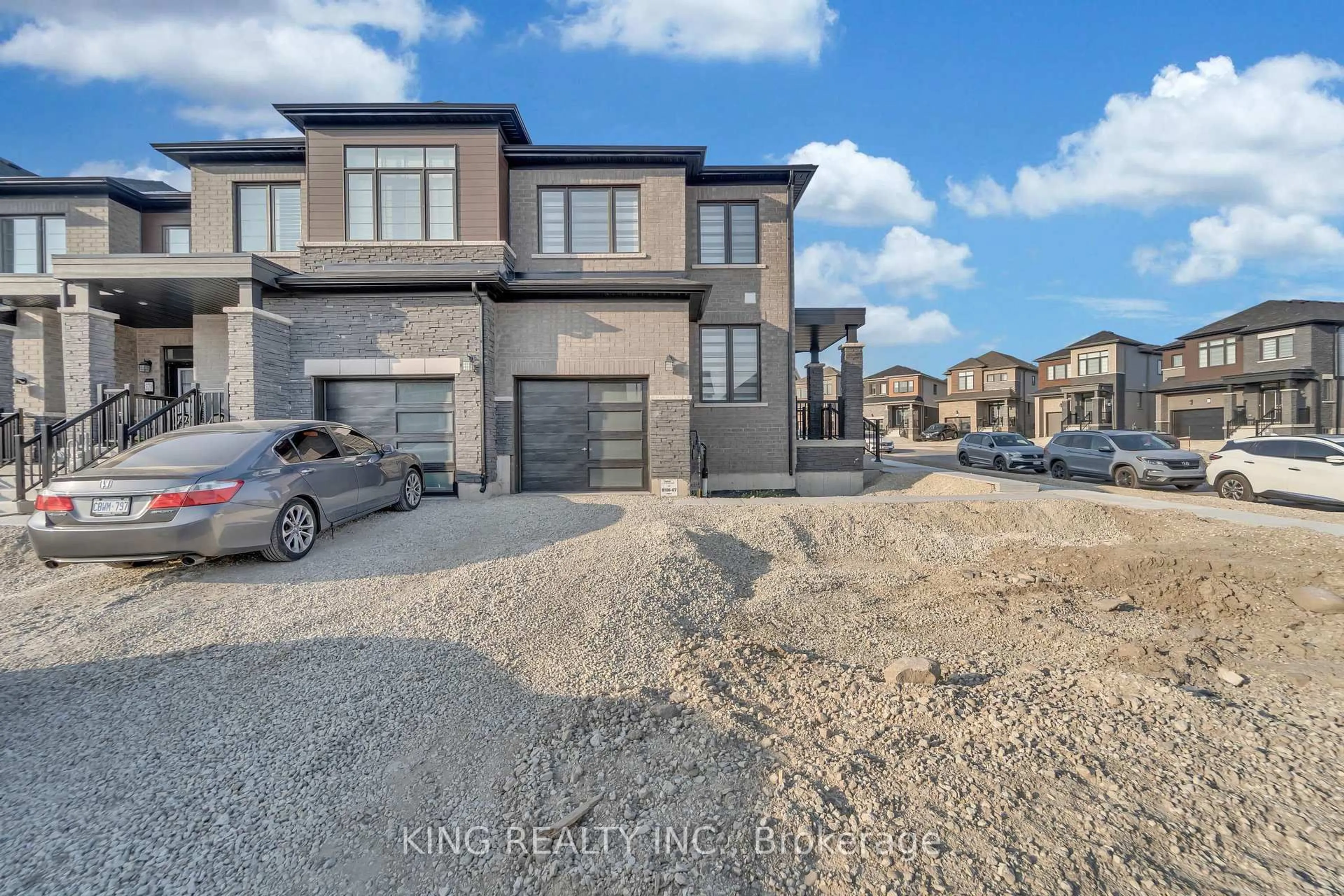 Home with brick exterior material, street for 127 Blacksmith Dr, Woolwich Ontario N0B 1M0