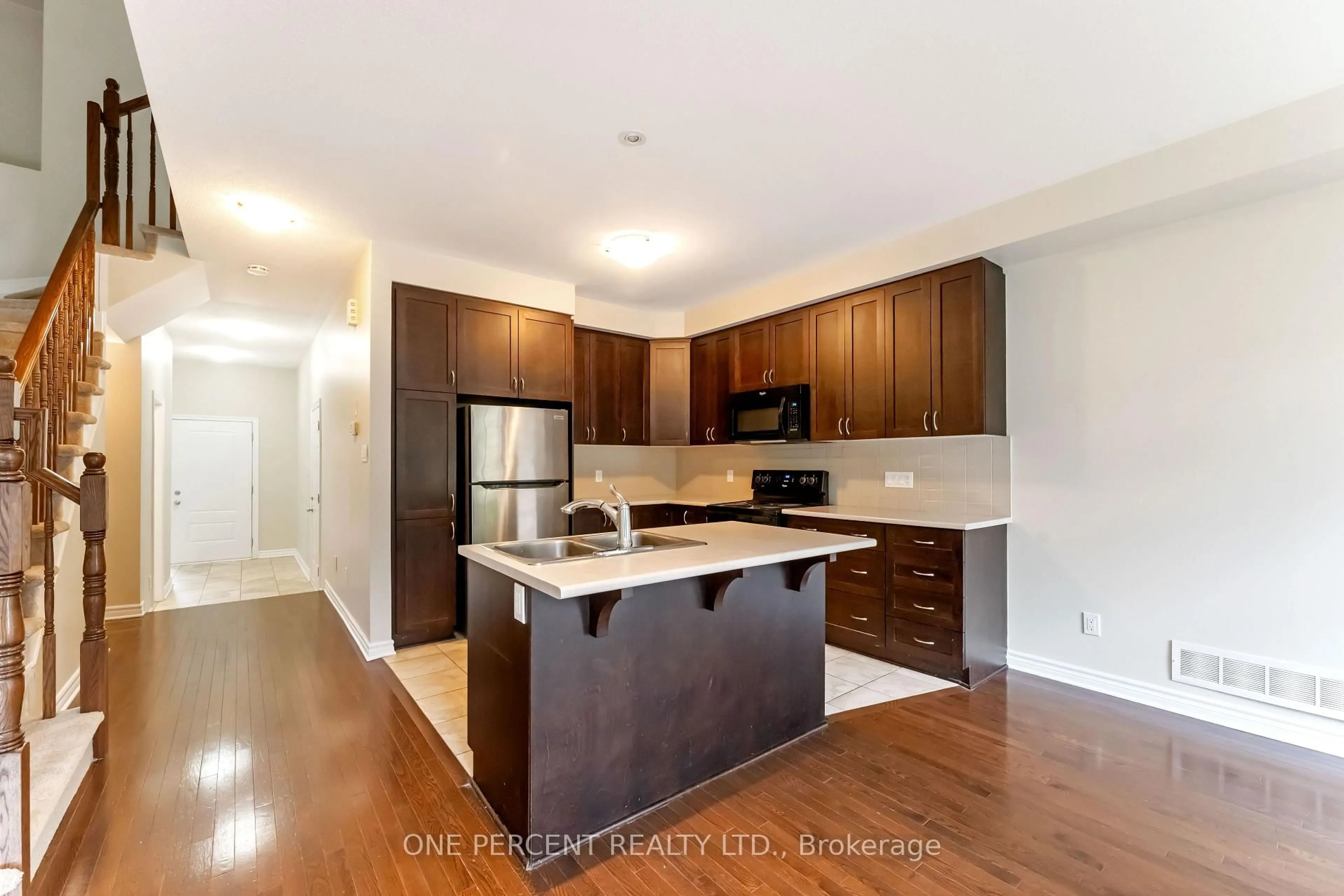 Open concept kitchen, wood/laminate floor for 213 Via San Marino St, Cornwall Ontario K6H 5R6